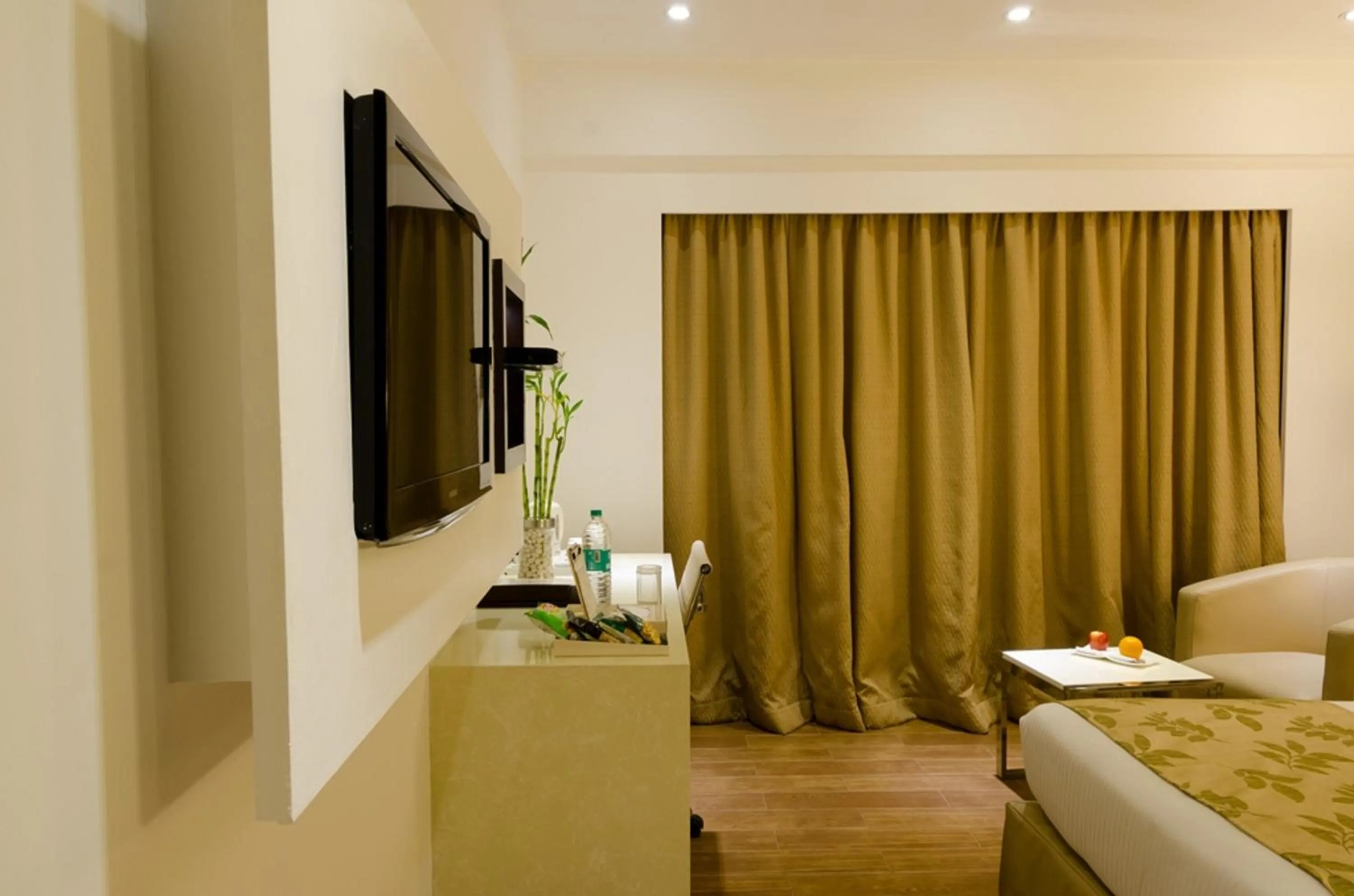 Bedroom, Bed in Ramee Grand Hotel and Spa, Pune