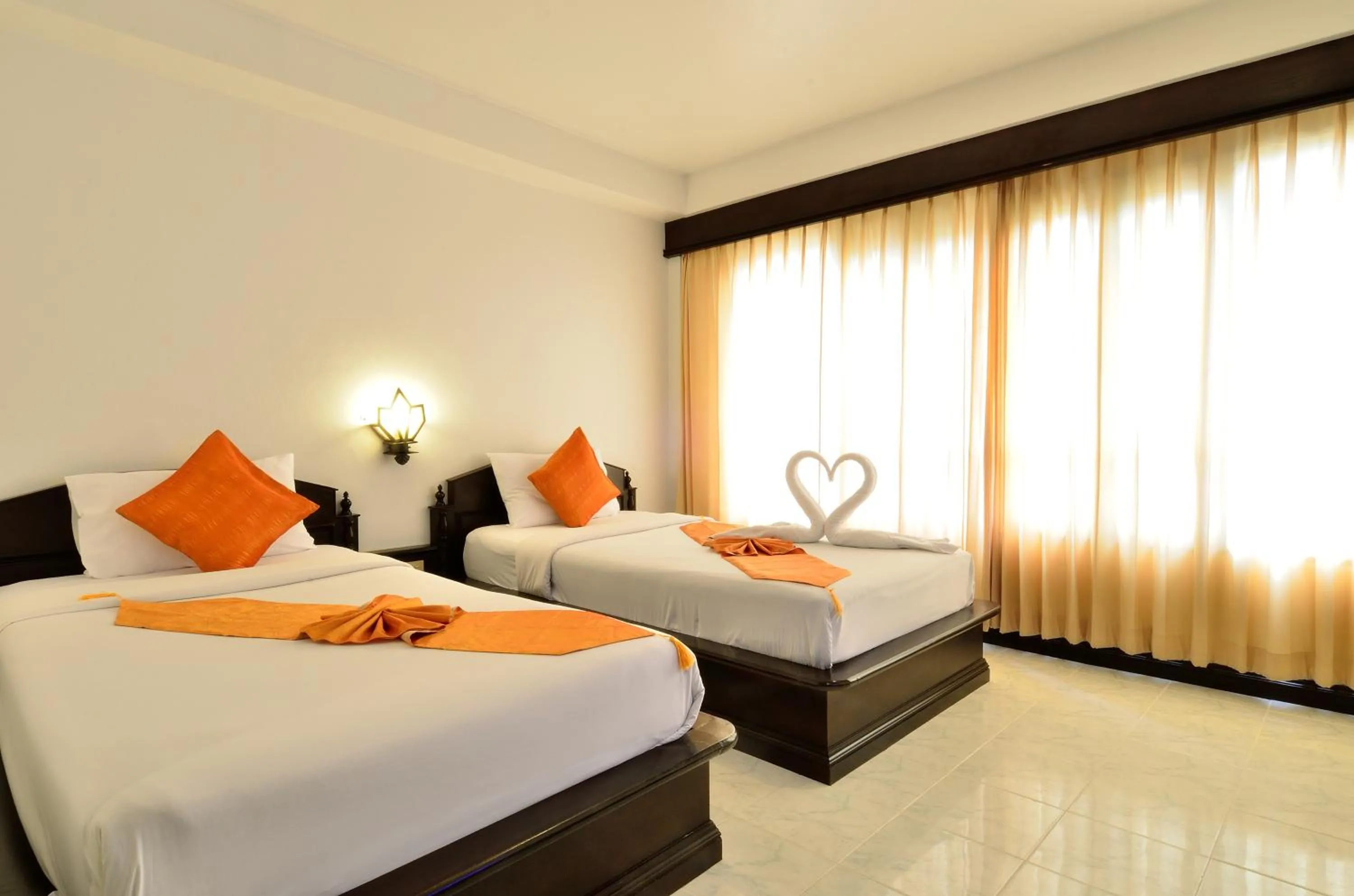 Bed in Samui First House Hotel