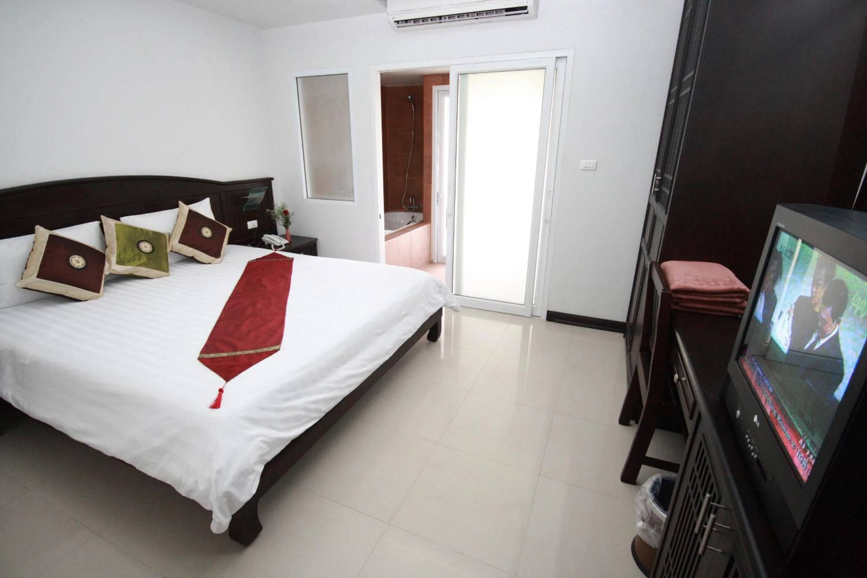 Photo of the whole room, Bed in Samui First House Hotel