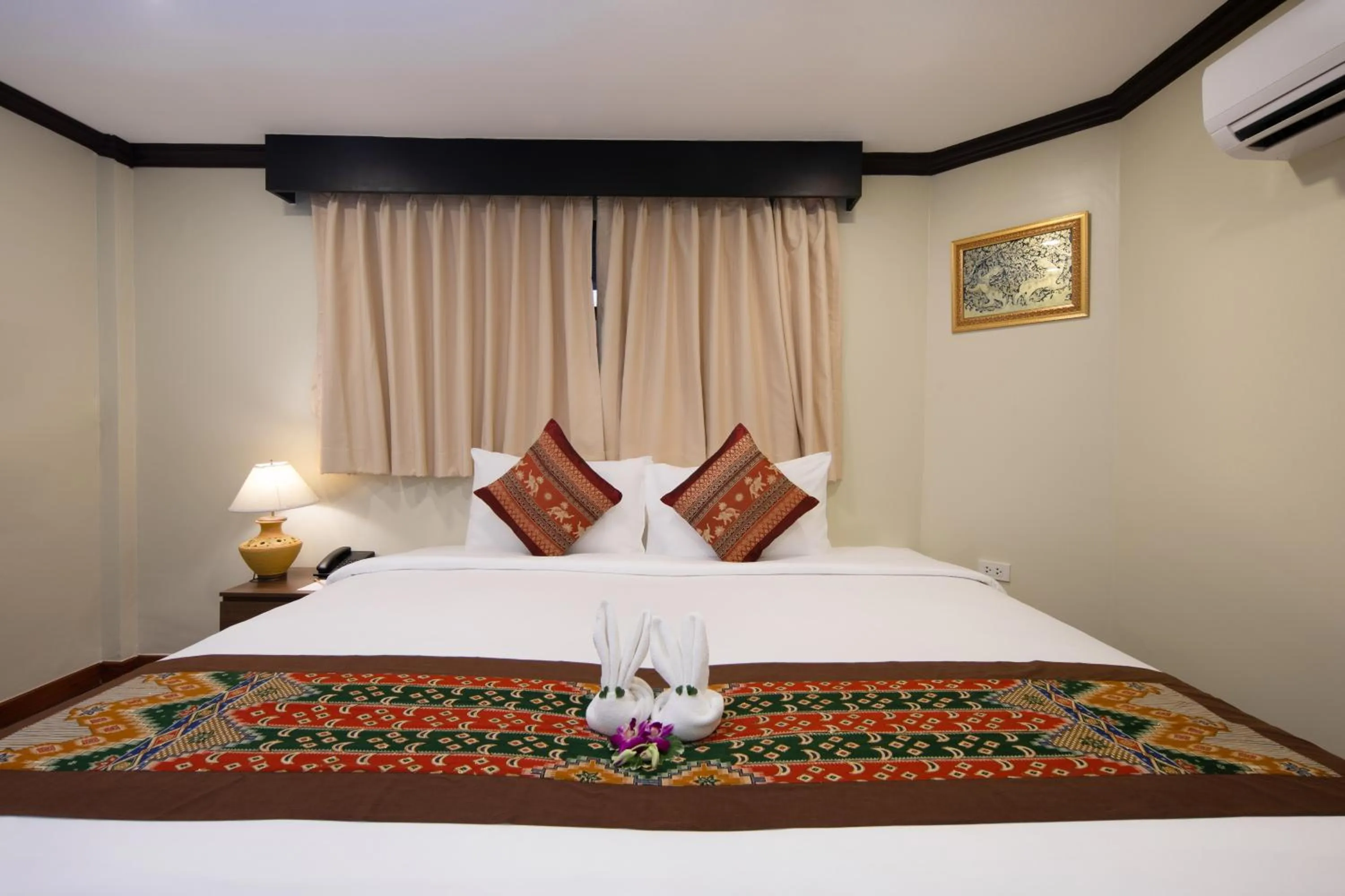 Bed in Princess Kamala Beachfront Hotel - SHA Extra Plus