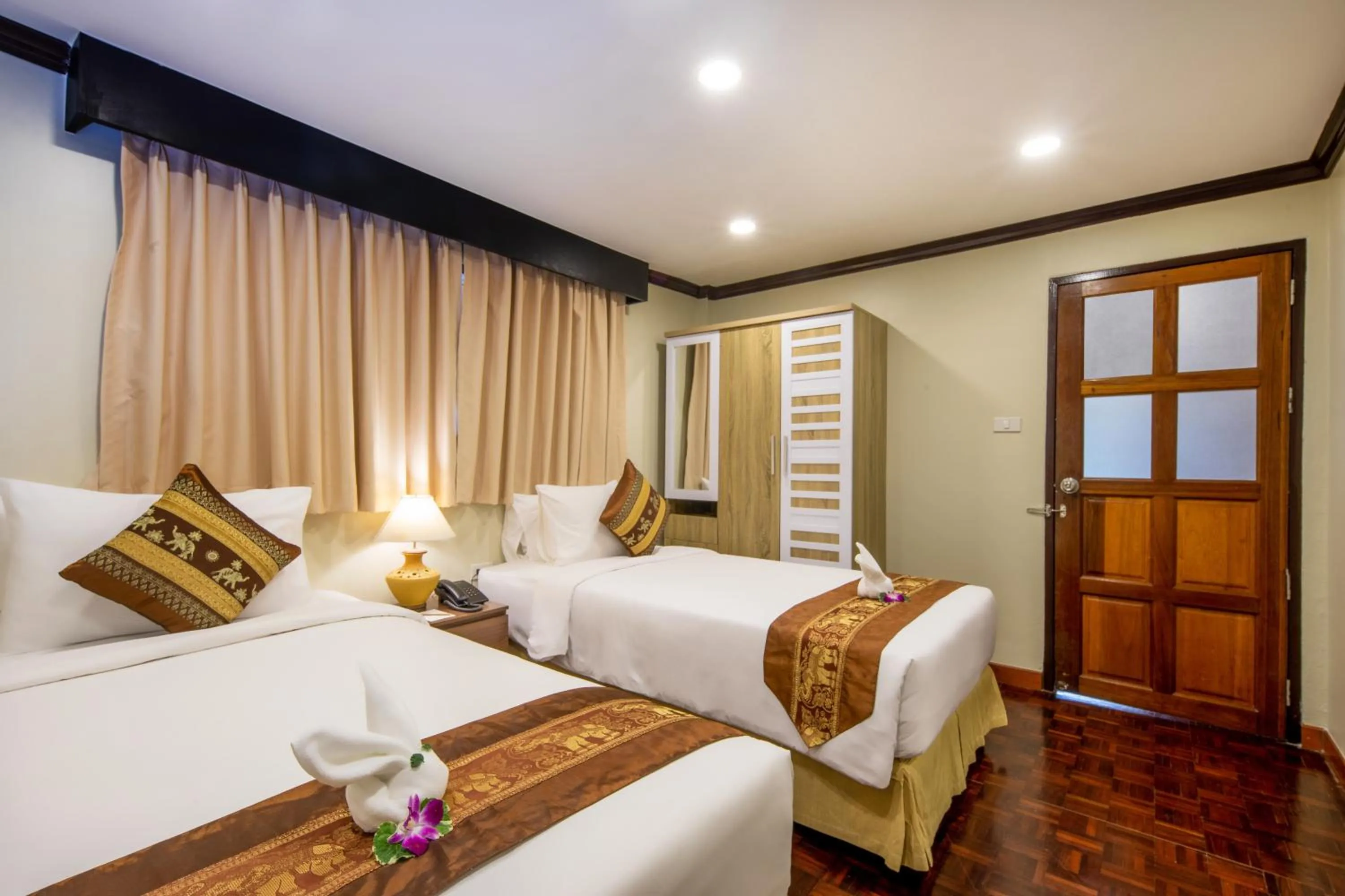 Bed in Princess Kamala Beachfront Hotel - SHA Extra Plus