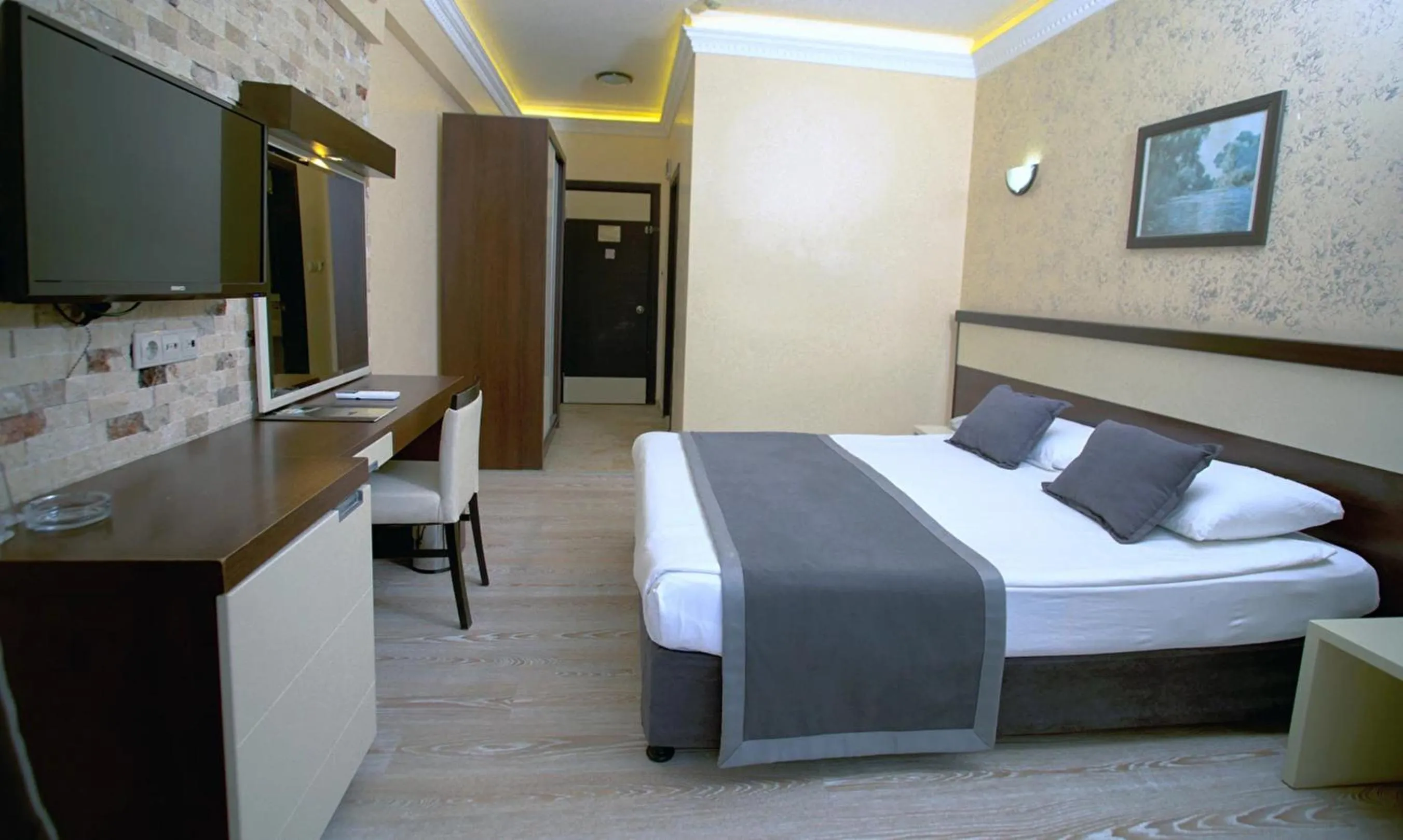 Bed in Camyuva Beach Hotel