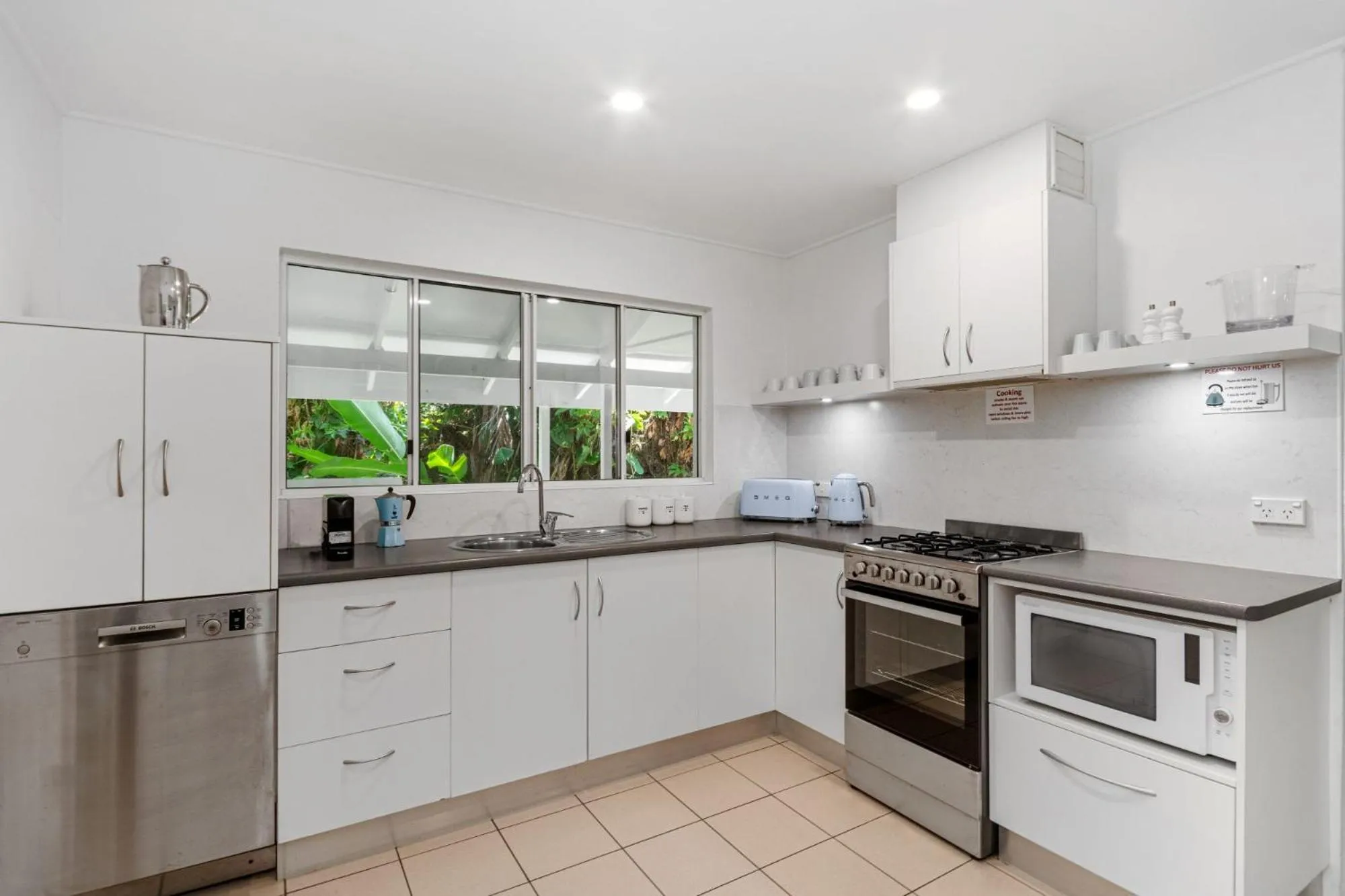 Kitchen or kitchenette in By The Sea Port Douglas