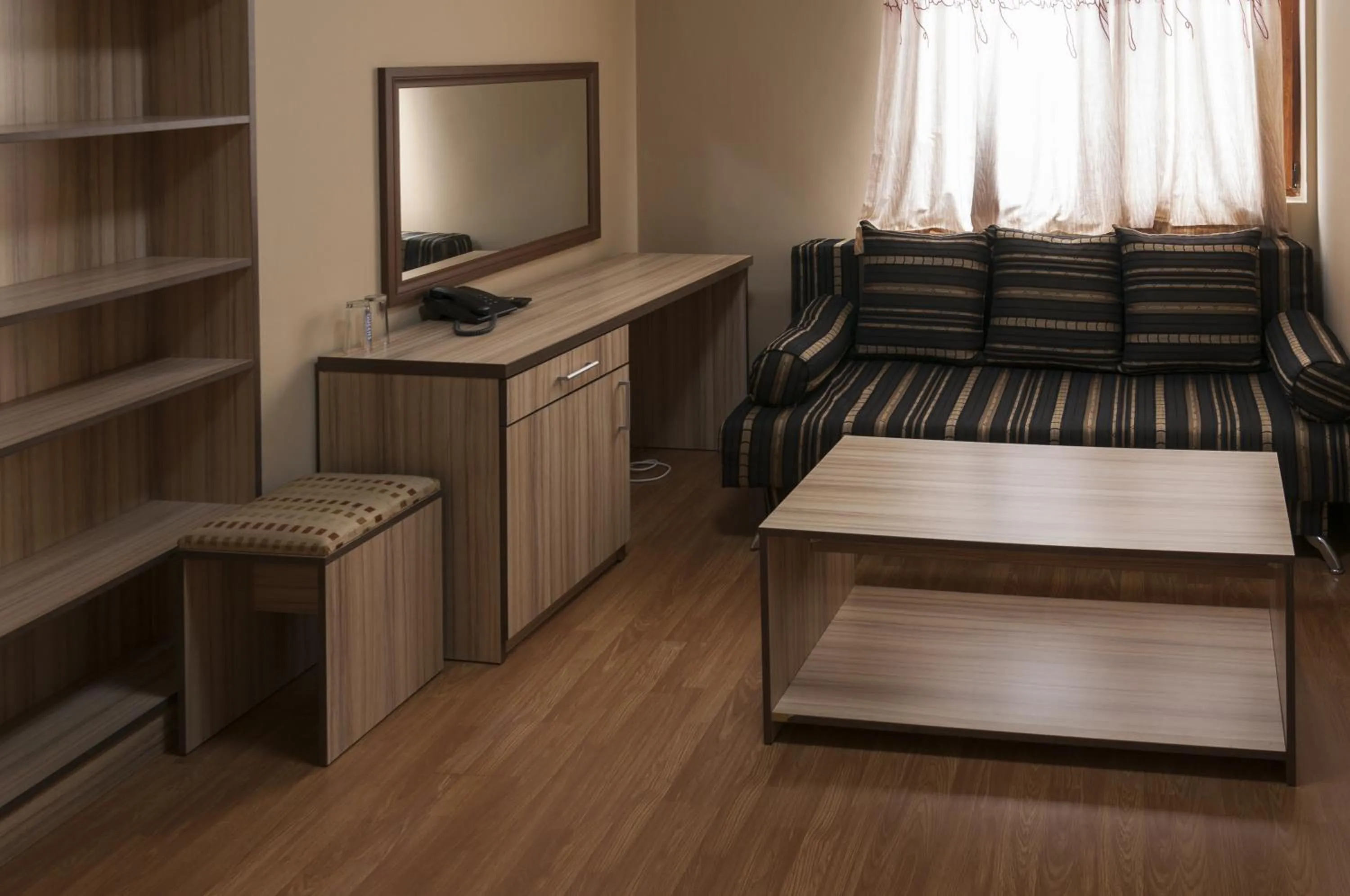 Living room, Bed in Family Hotel Pautalia