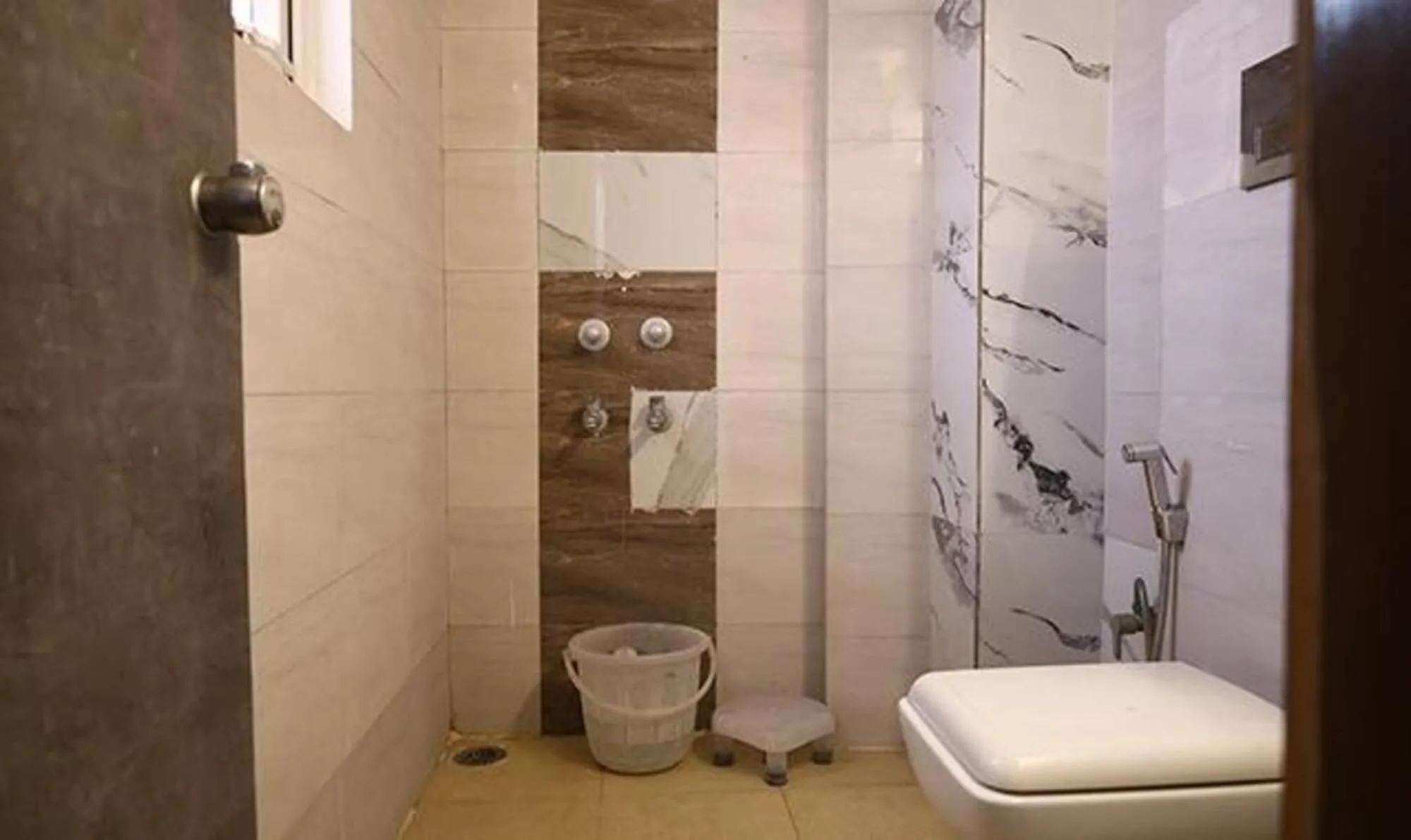 Bathroom in FabHotel HSP Suites - Near IGI Airport - New Delhi