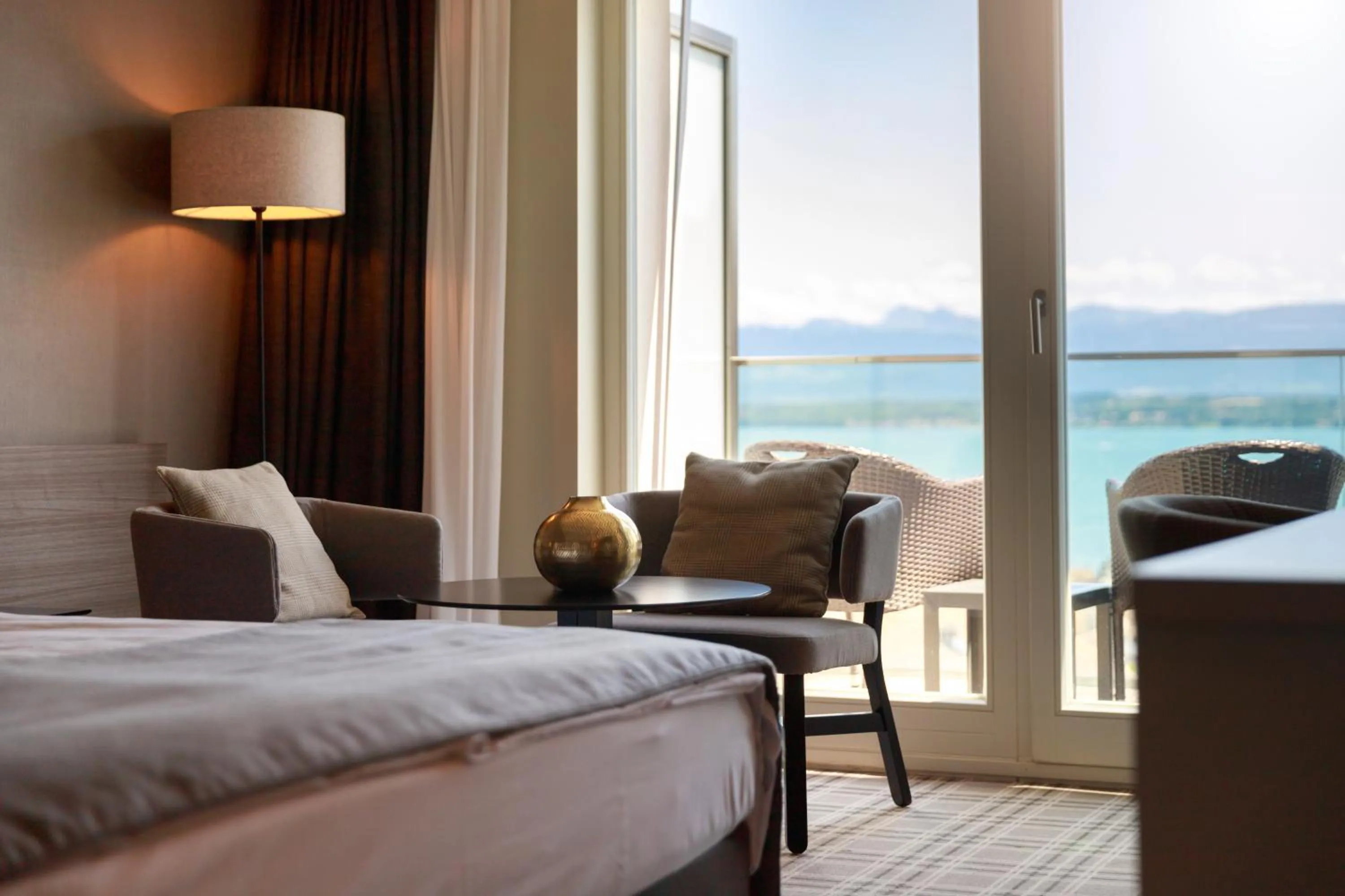 Seating area, Bed in Ambassador Boutique Hotel