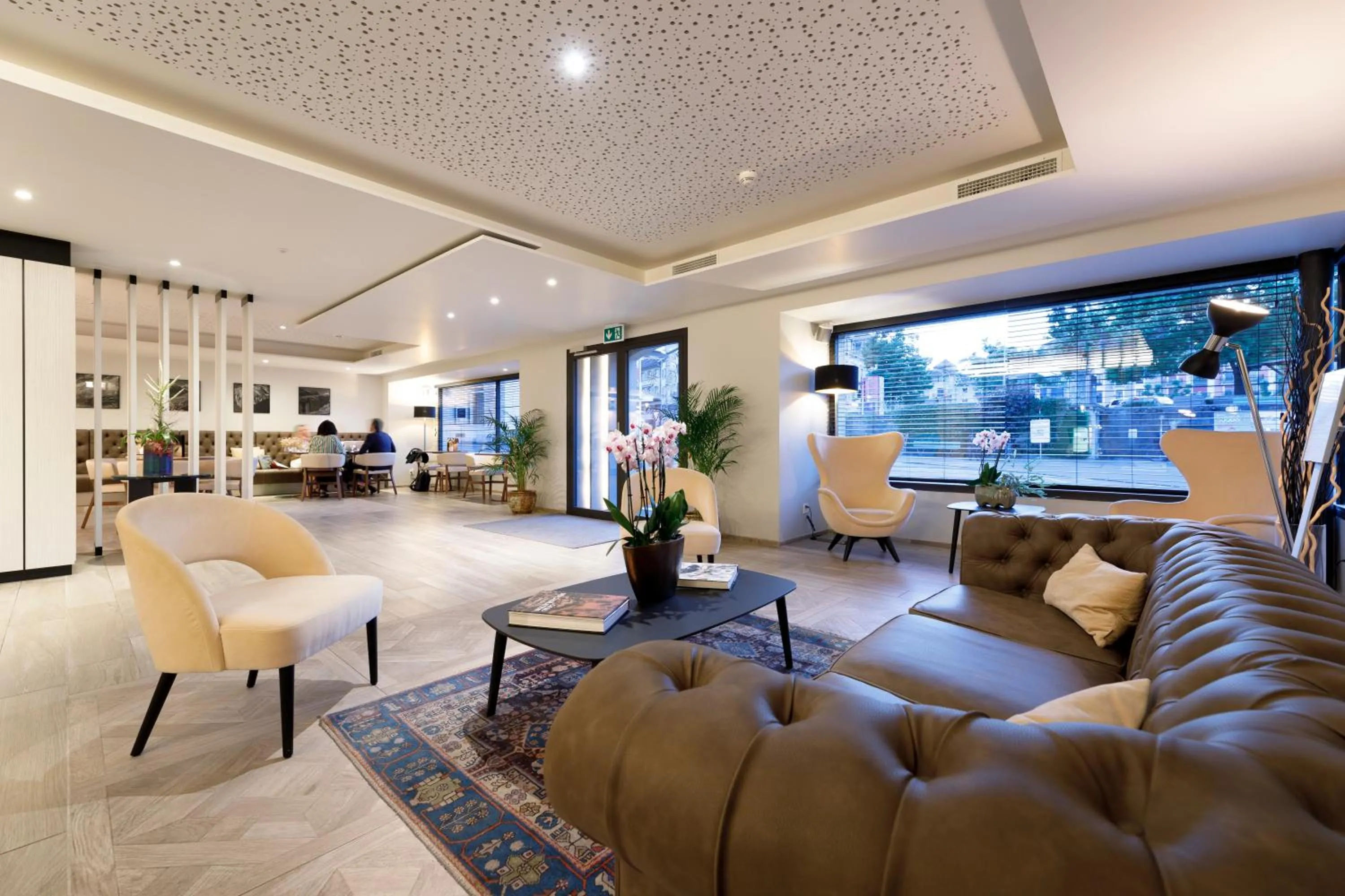 Lobby or reception in Ambassador Boutique Hotel