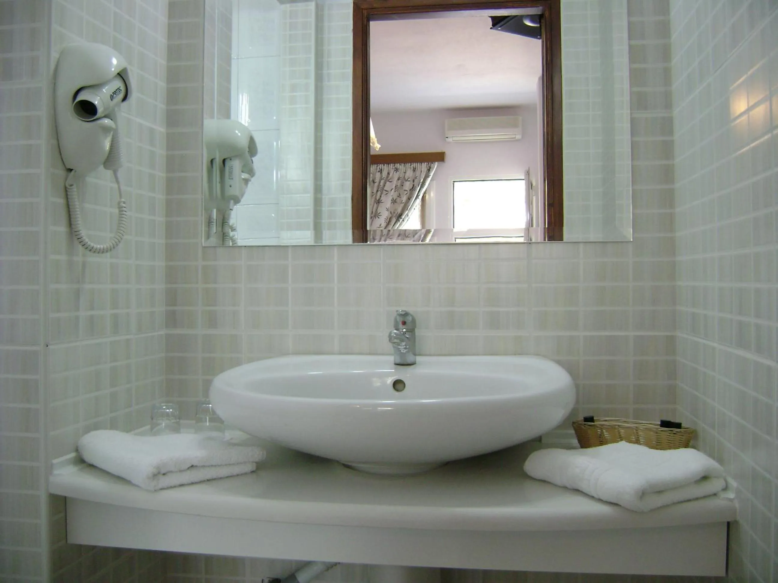 Toilet in Rihios Hotel