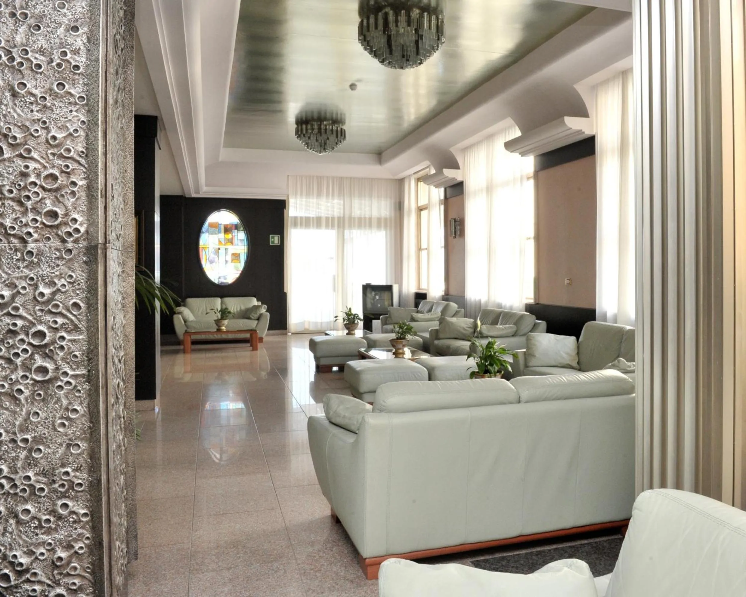 Communal lounge/ TV room in Hotel Pietra di Luna