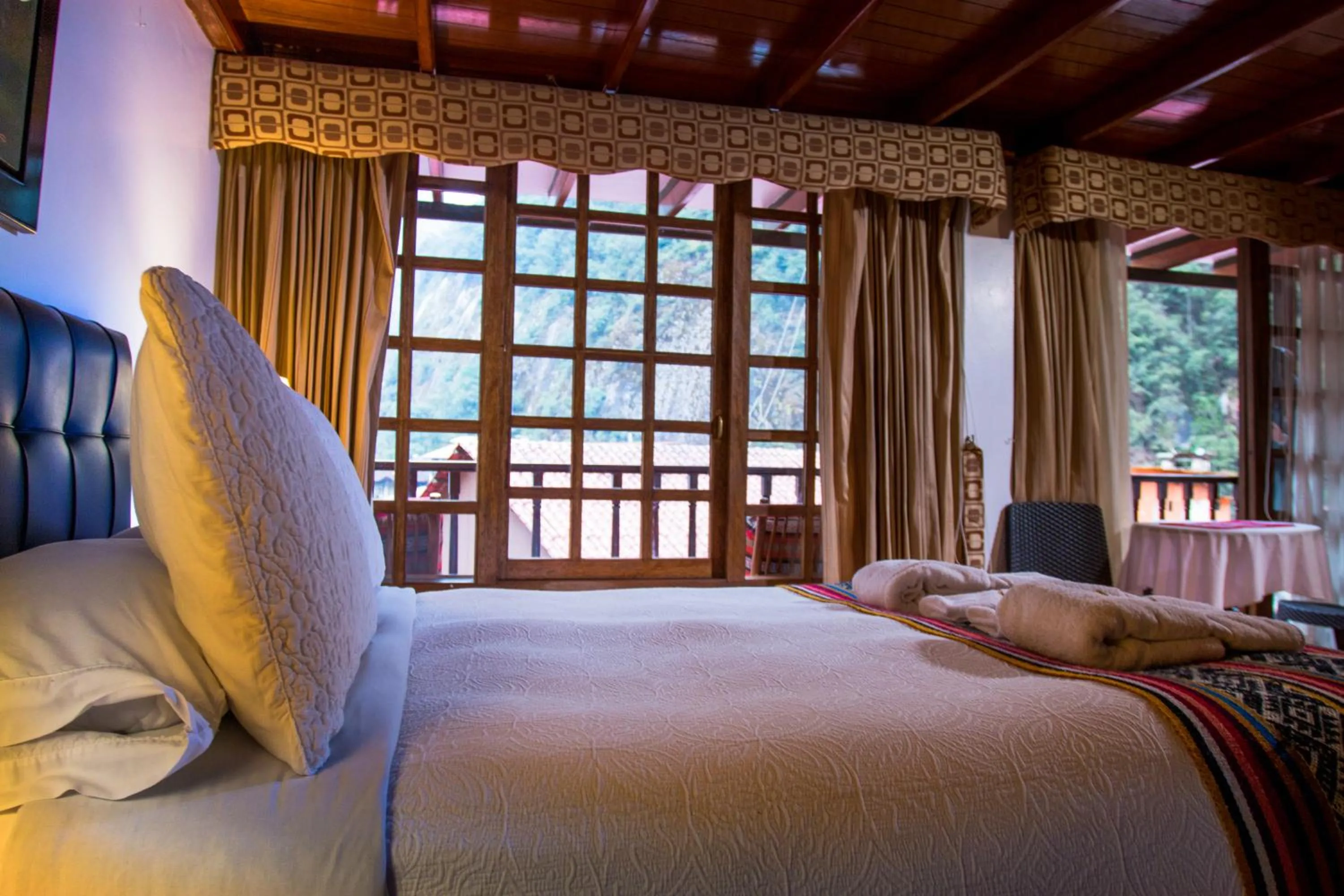 Bed in Gringo Bill's Boutique Hotel