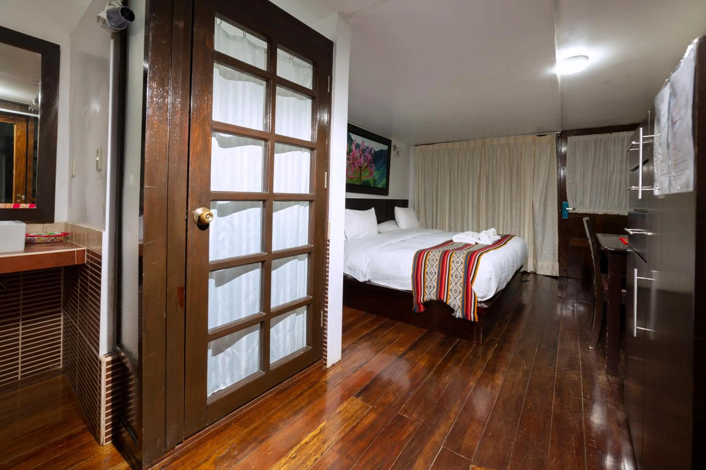 Bed in Gringo Bill's Boutique Hotel