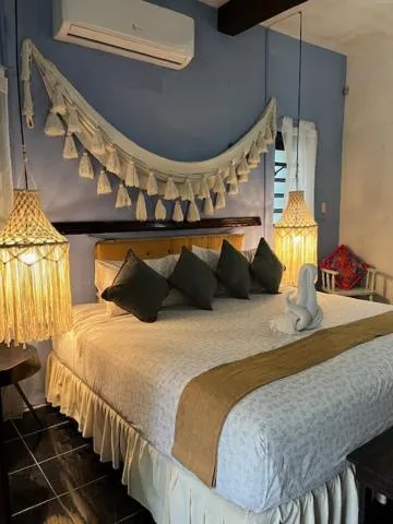 Bed in Casa Aluxes Hotel