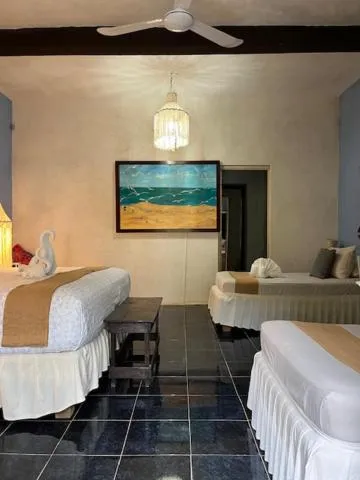 Bed in Casa Aluxes Hotel