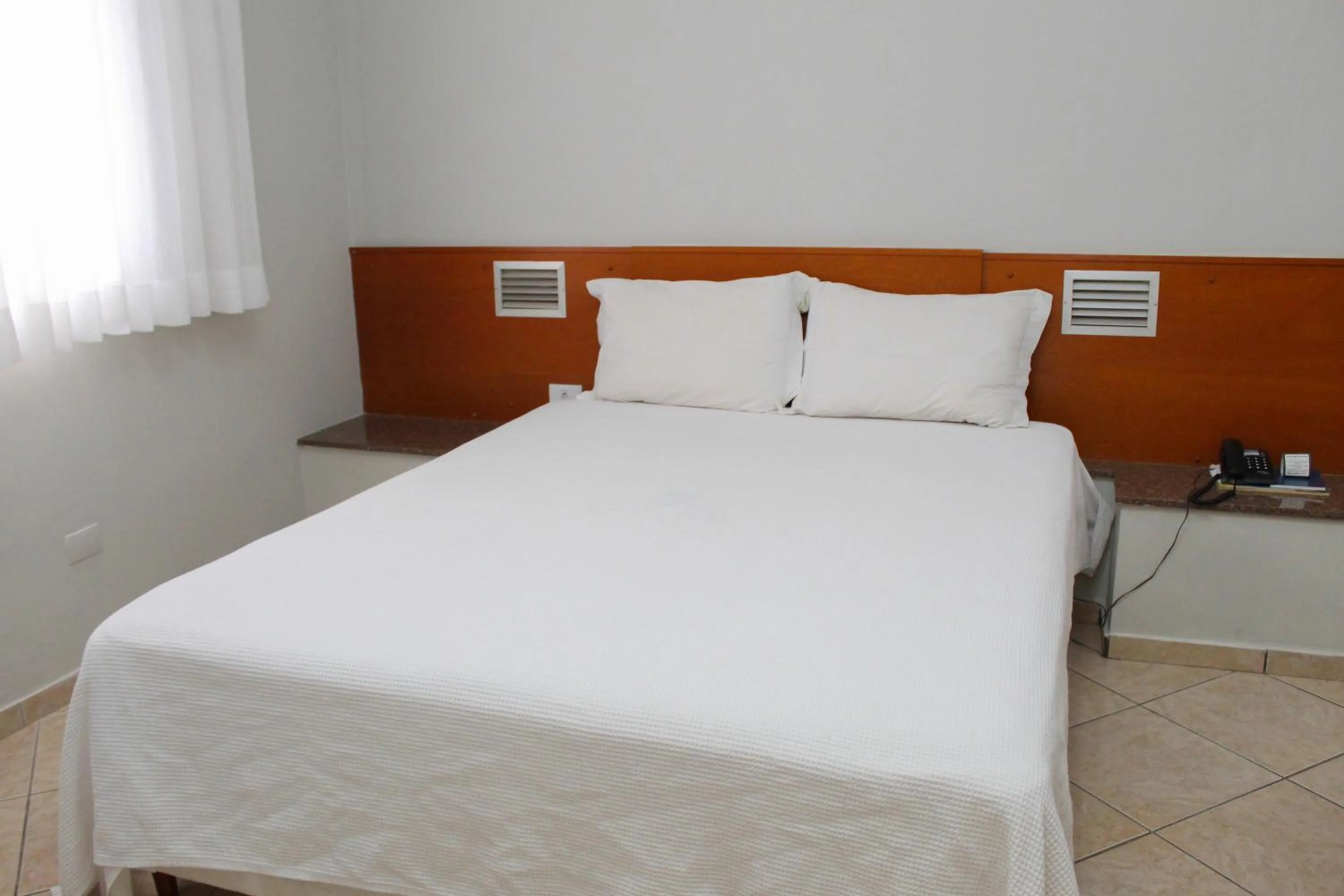 Bed in Ônix Hotel