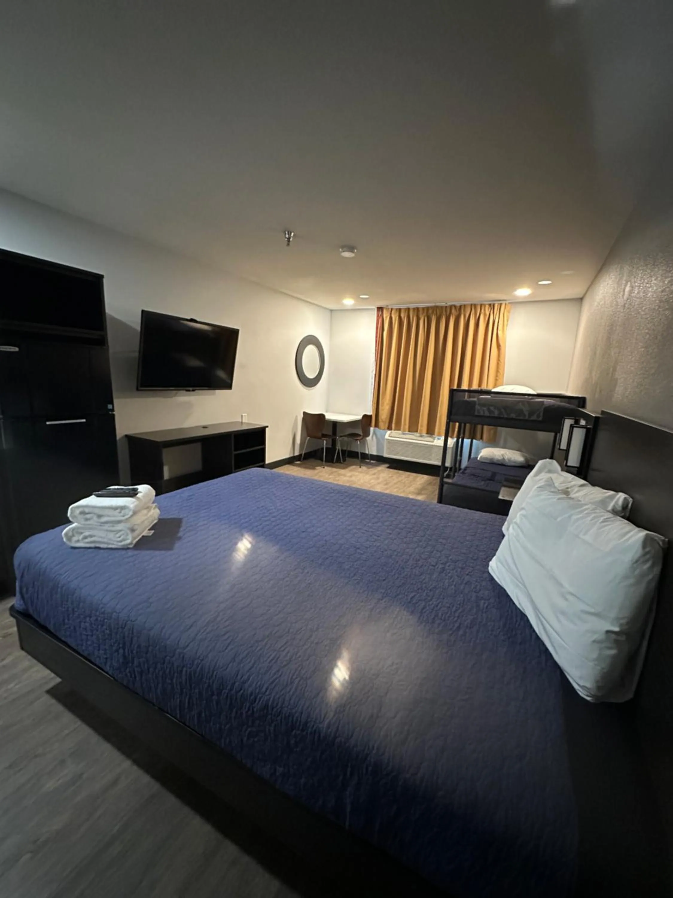 Bed in Pinetop Studio Suites