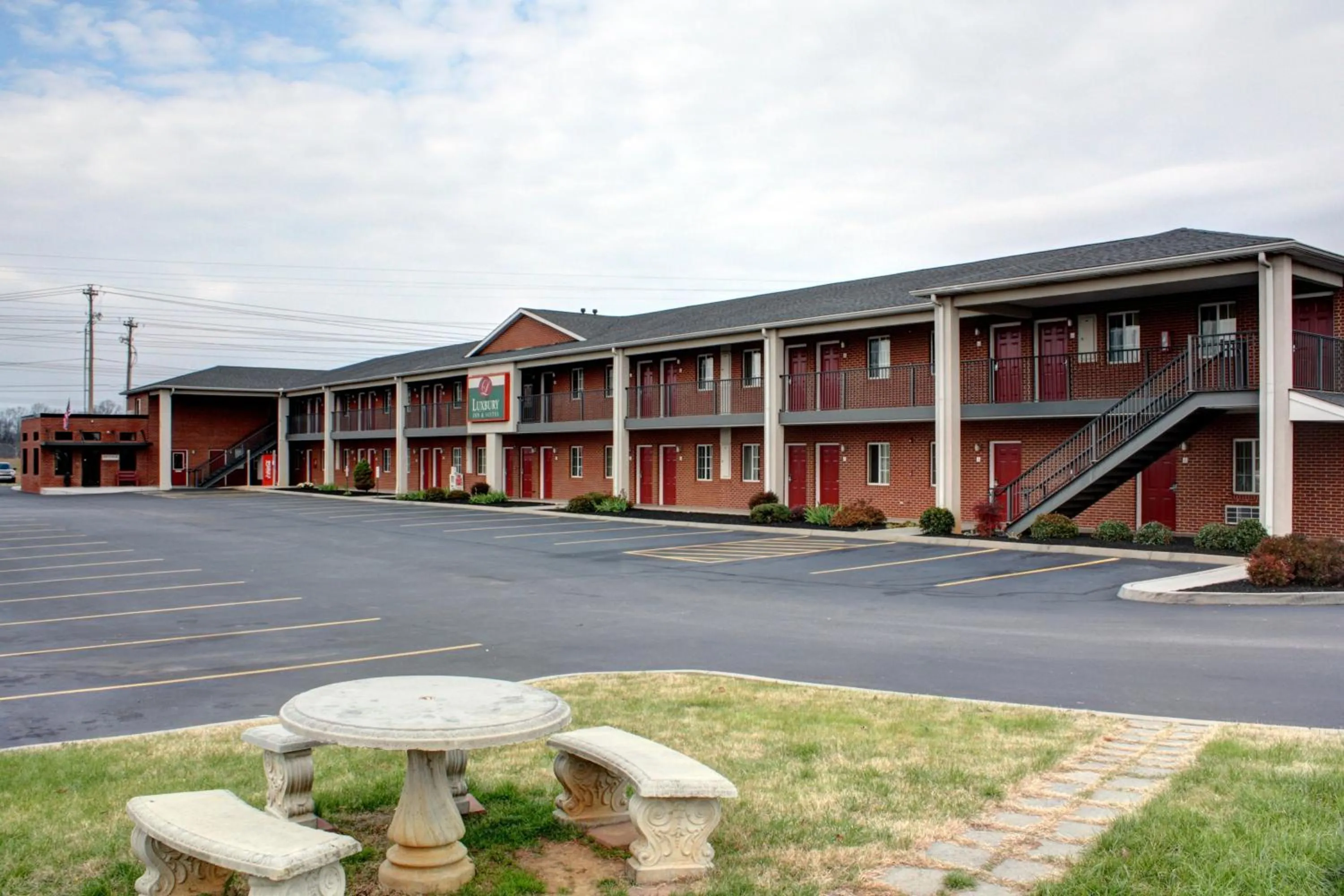 Property building in Luxbury Inn & Suites