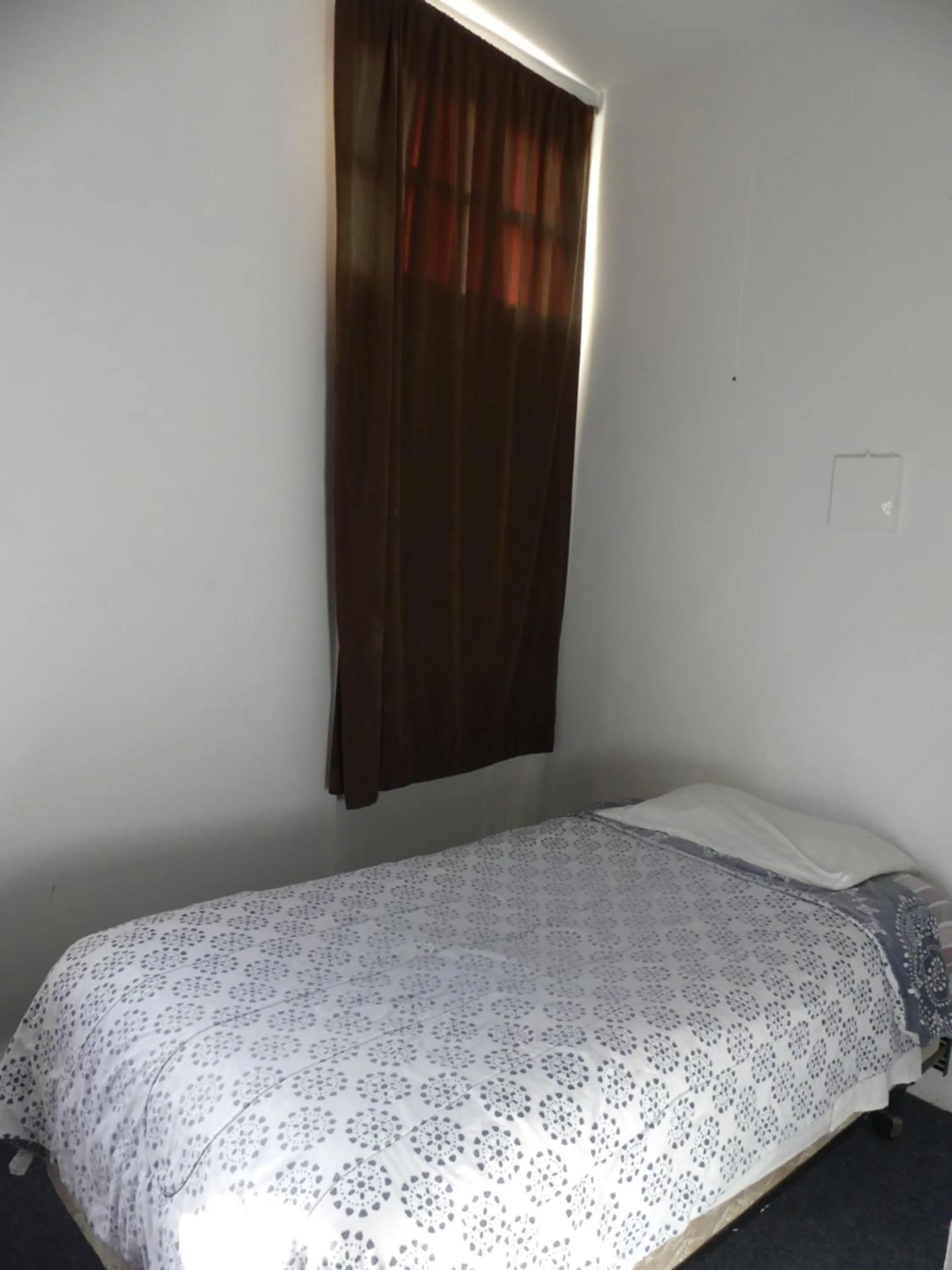 Bed in Wilshire Orange Hotel