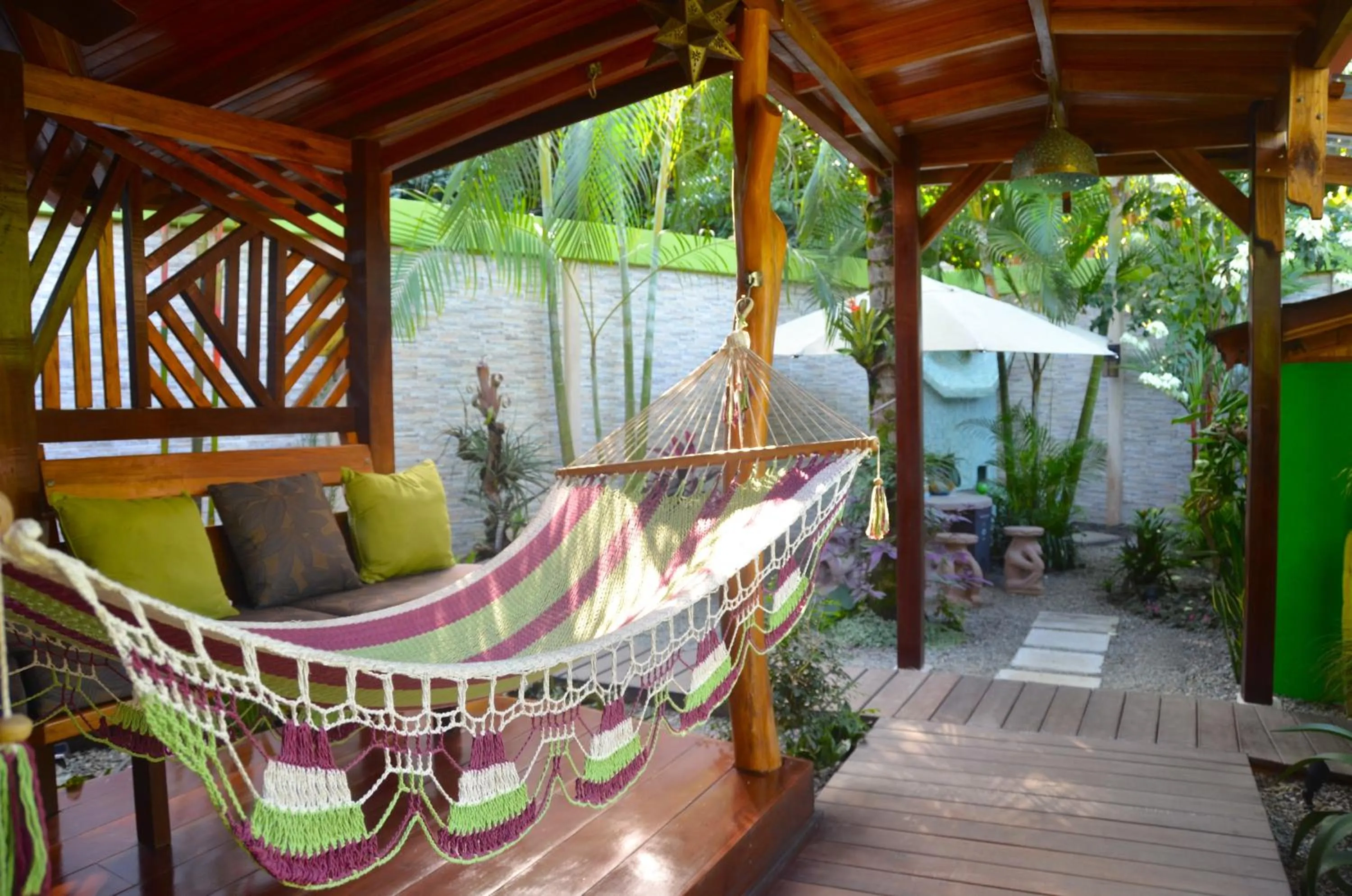 Communal lounge/ TV room in Physis Caribbean Bed & Breakfast