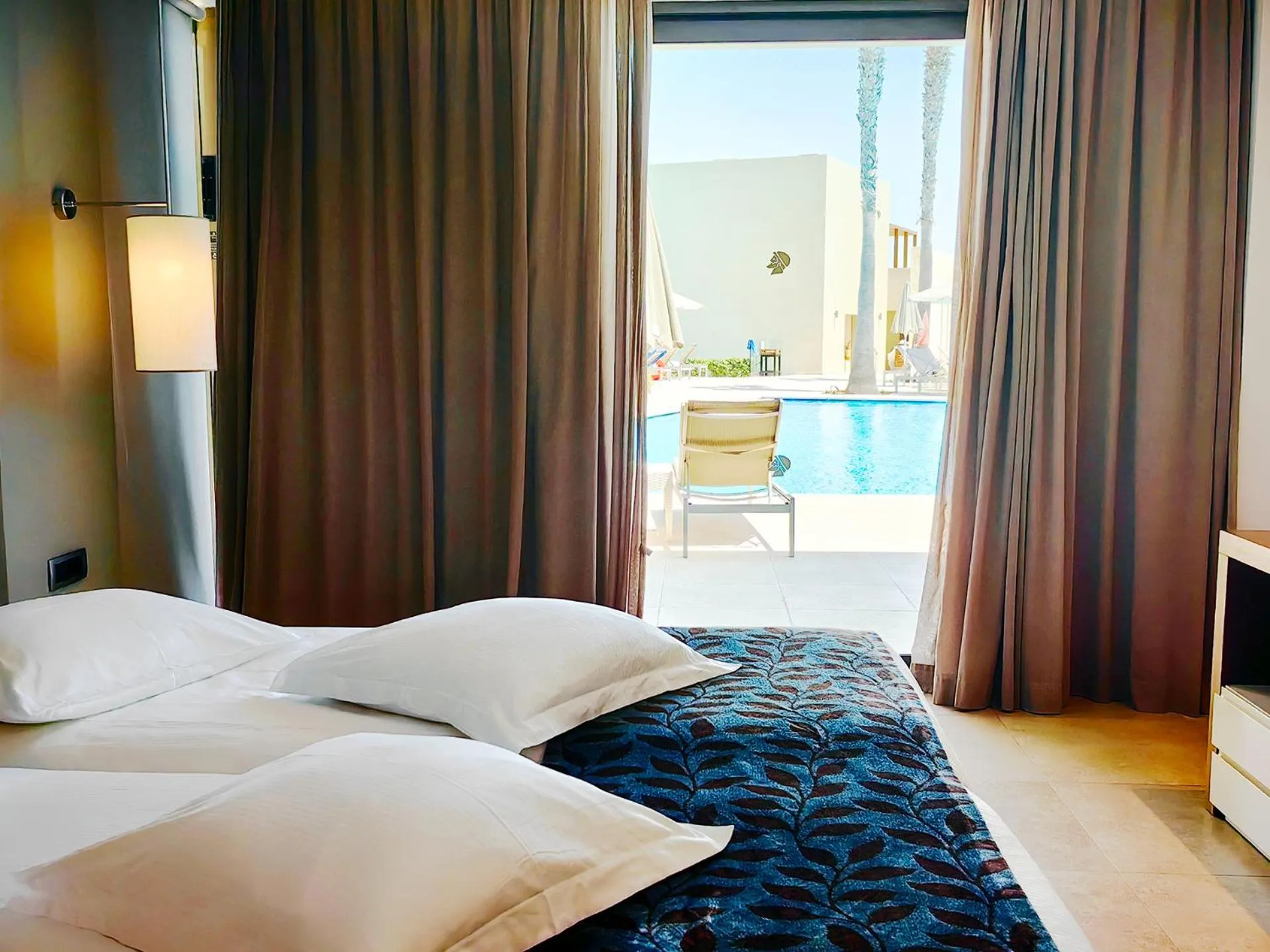 Bed in Astir Odysseus Kos Resort and Spa