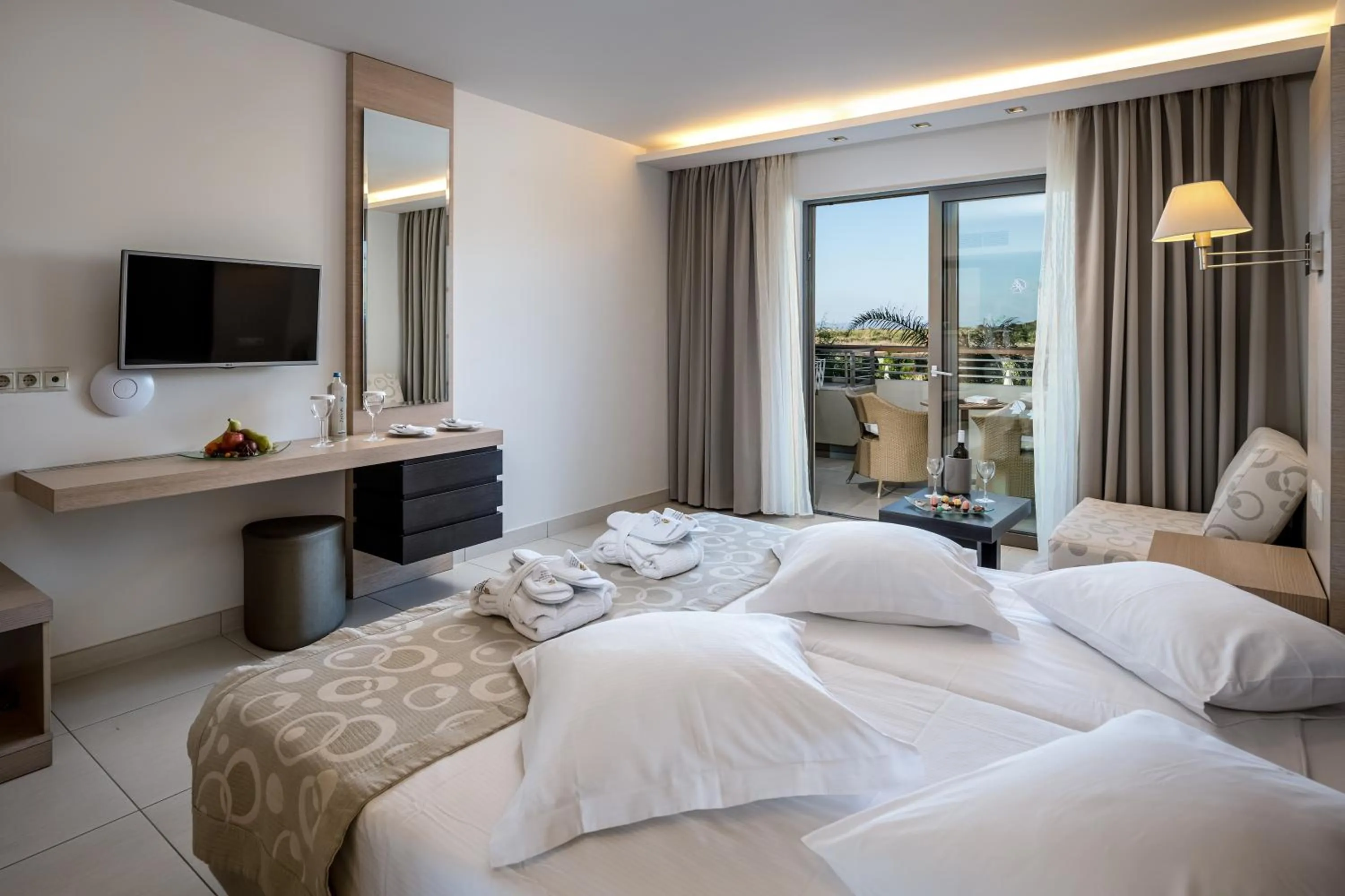 TV and multimedia, Bed in Astir Odysseus Kos Resort and Spa