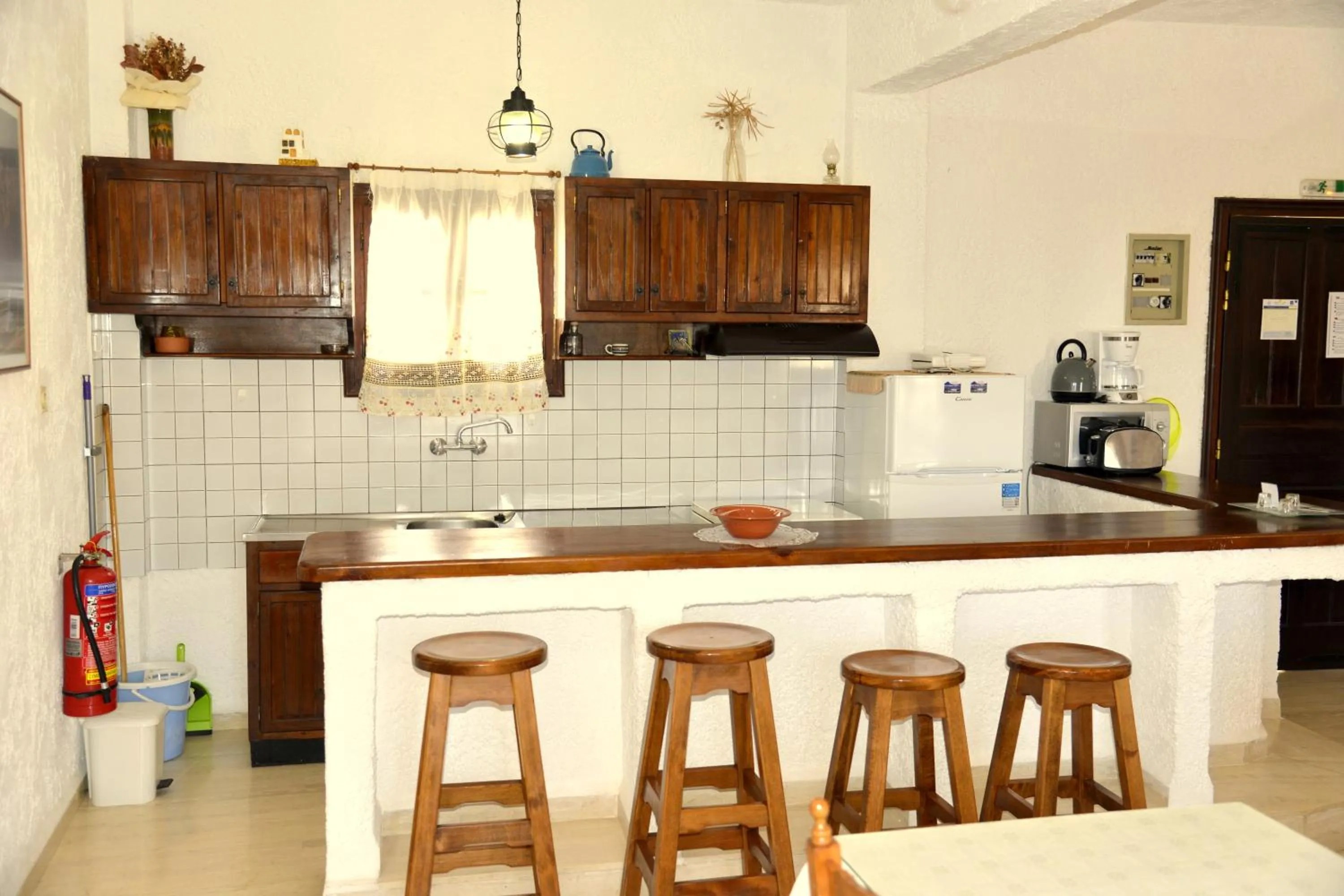 Kitchen or kitchenette in Filoxenia Villa