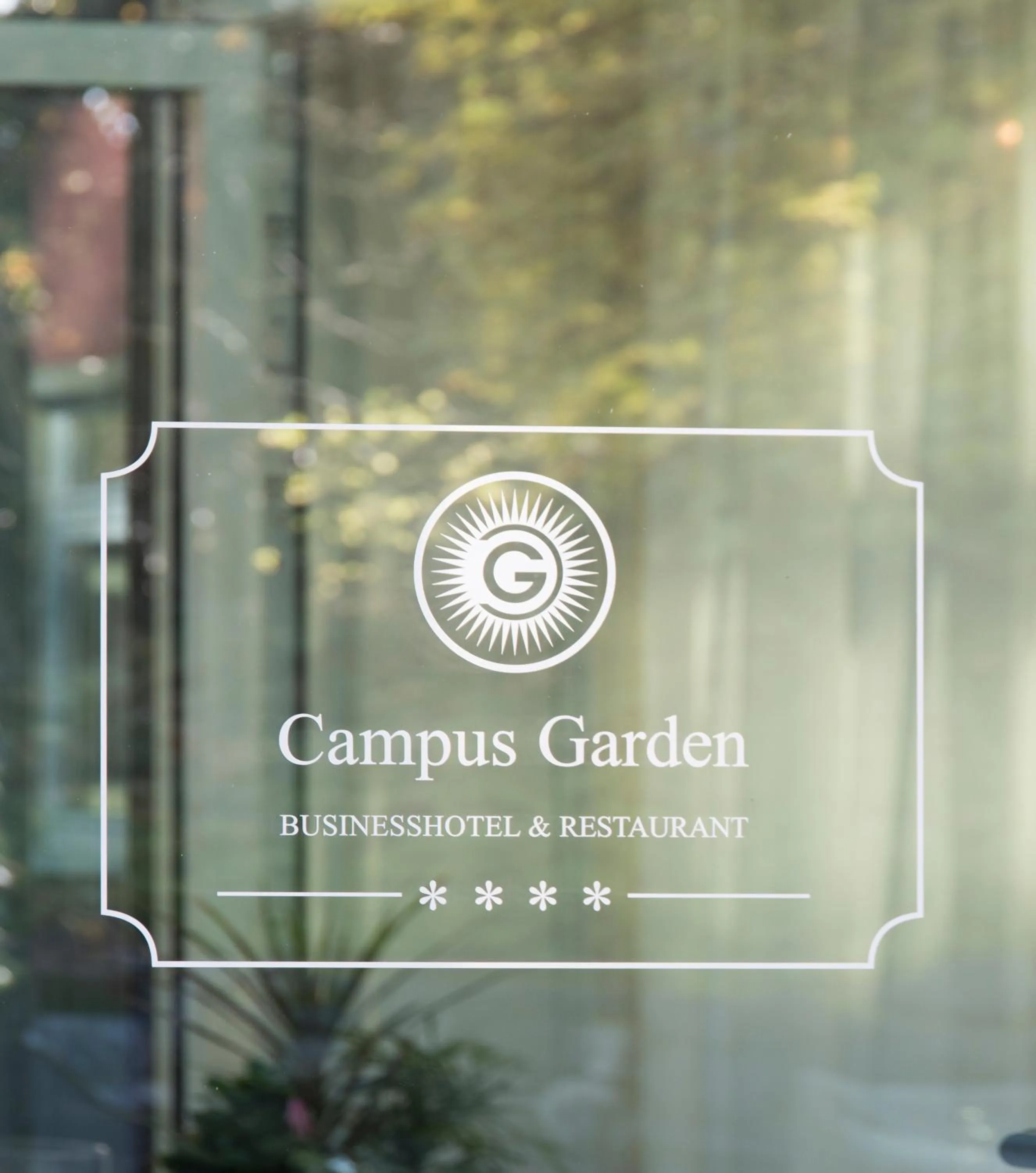Property logo or sign in Campus Garden Businesshotel