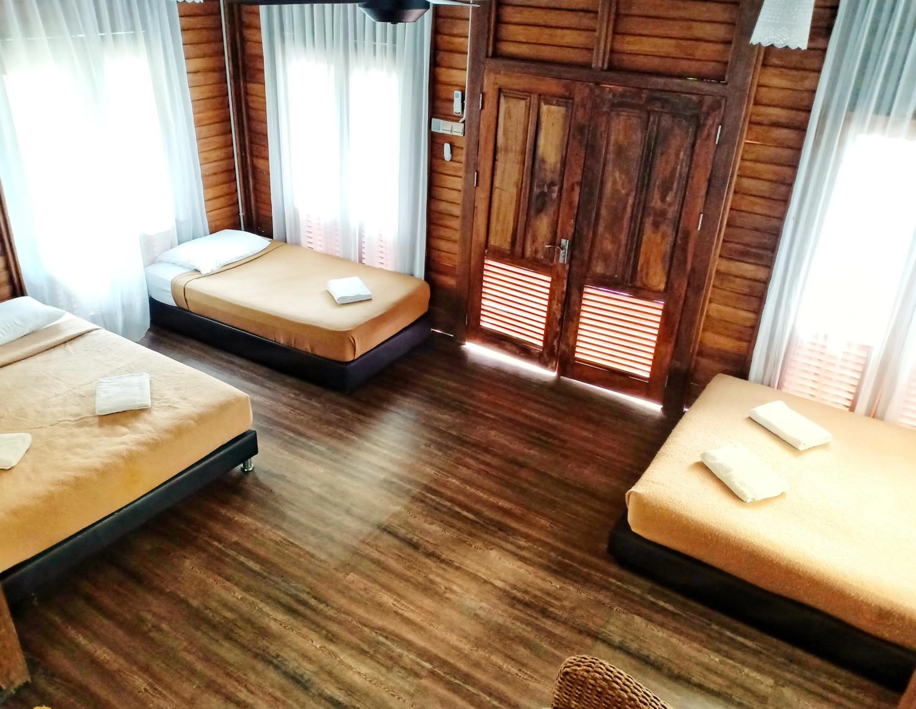 Bed in Bayu Lestari Island Resort