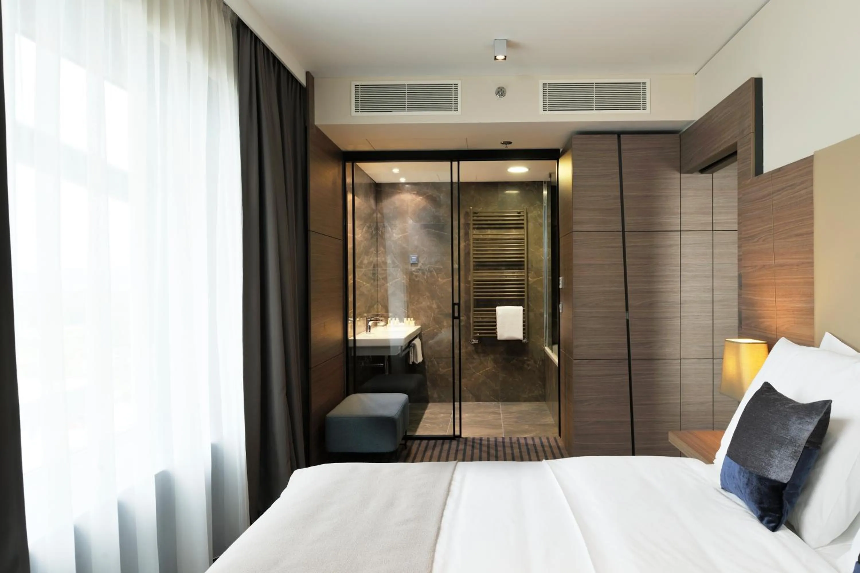 Bed in Radisson Blu Plaza Hotel Ljubljana