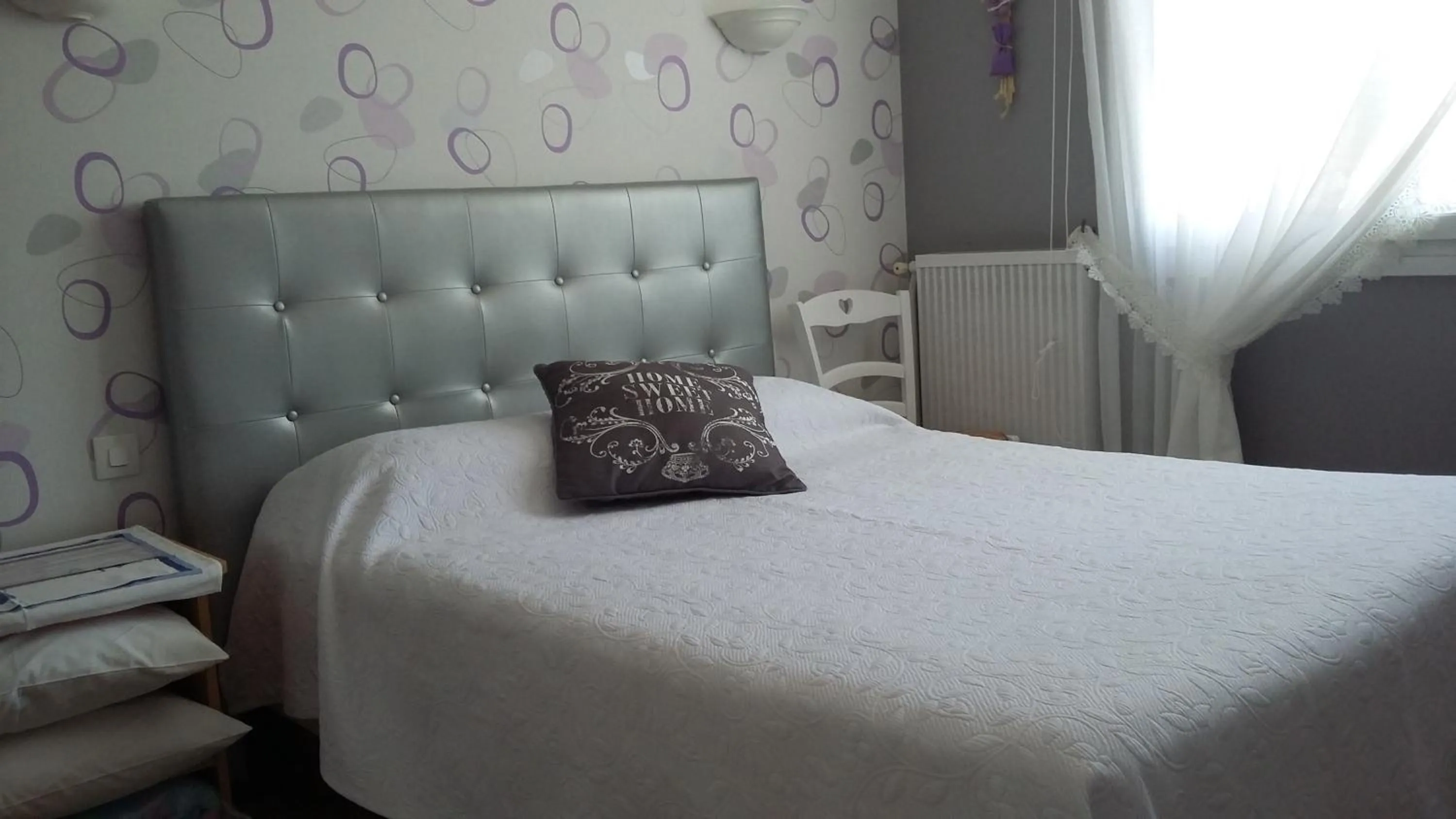 Bed in A La Bonne Adresse