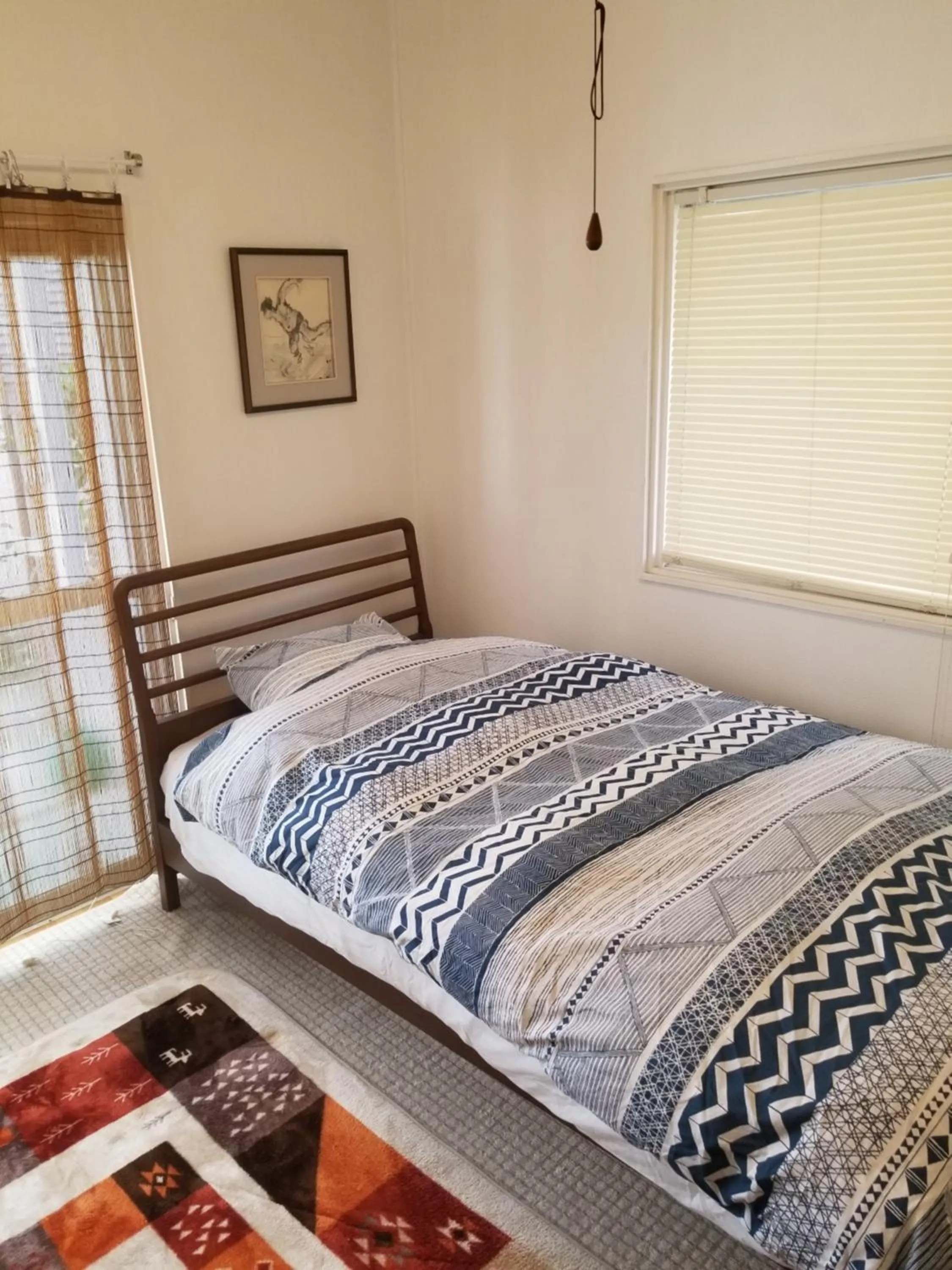 Bed in EMS Enoshima クラシックゲストハウス 寝室は個室 犬OK