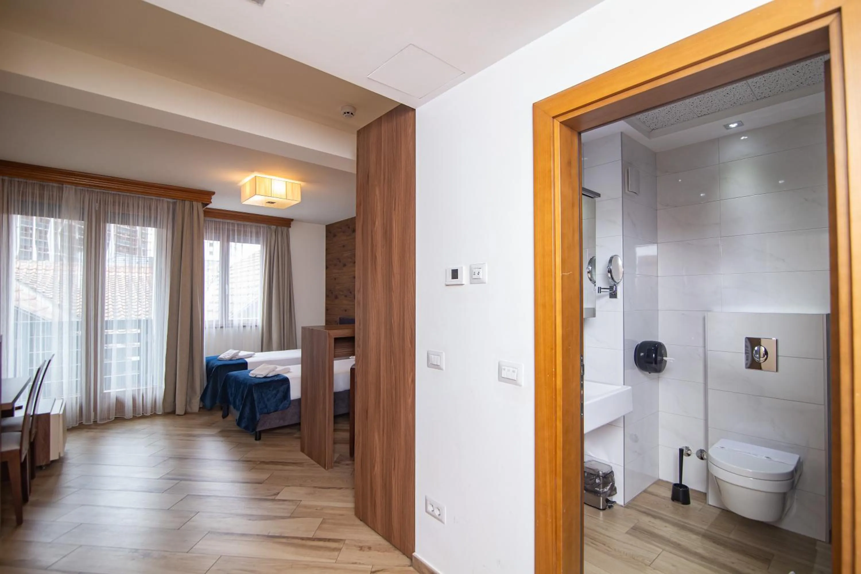 Toilet, Bed in Central Inn