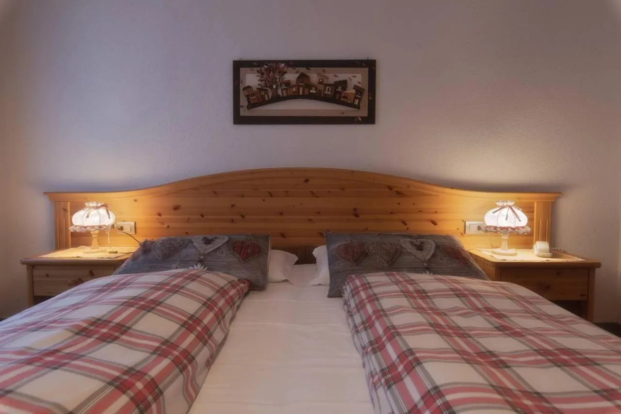 Bed in Dolomiti Hotel Cozzio
