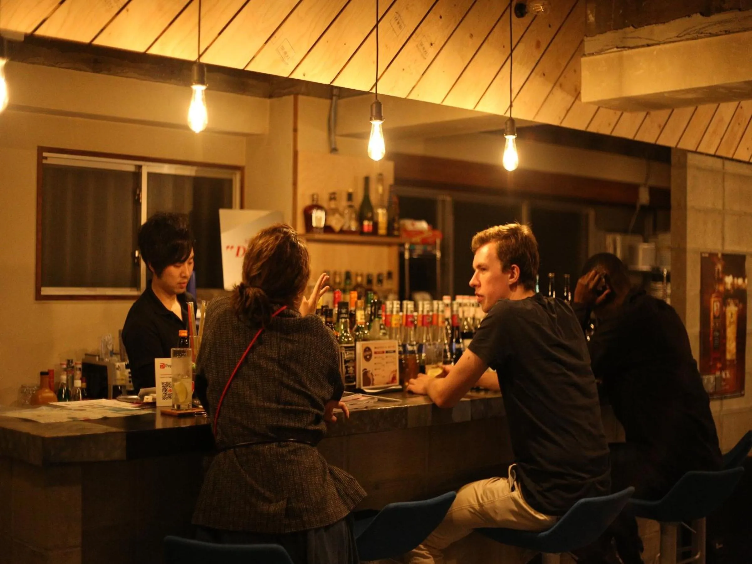 Lounge or bar in TRAVEL&BOOK HOTEL HULATONCABIN TAKAMATSU