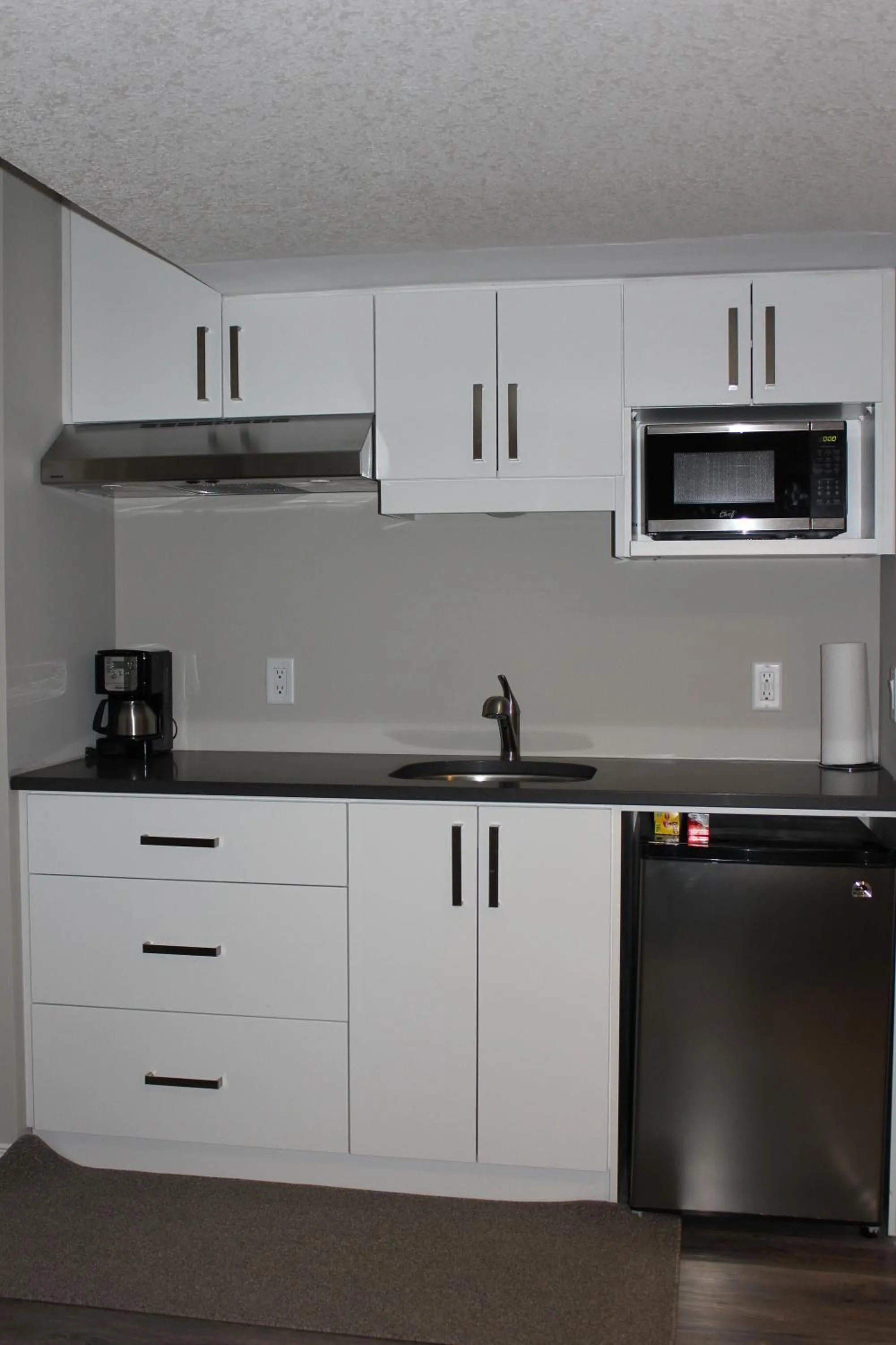 Kitchen or kitchenette in Boardwalk Homes - Vacation Homes & Executive Suites