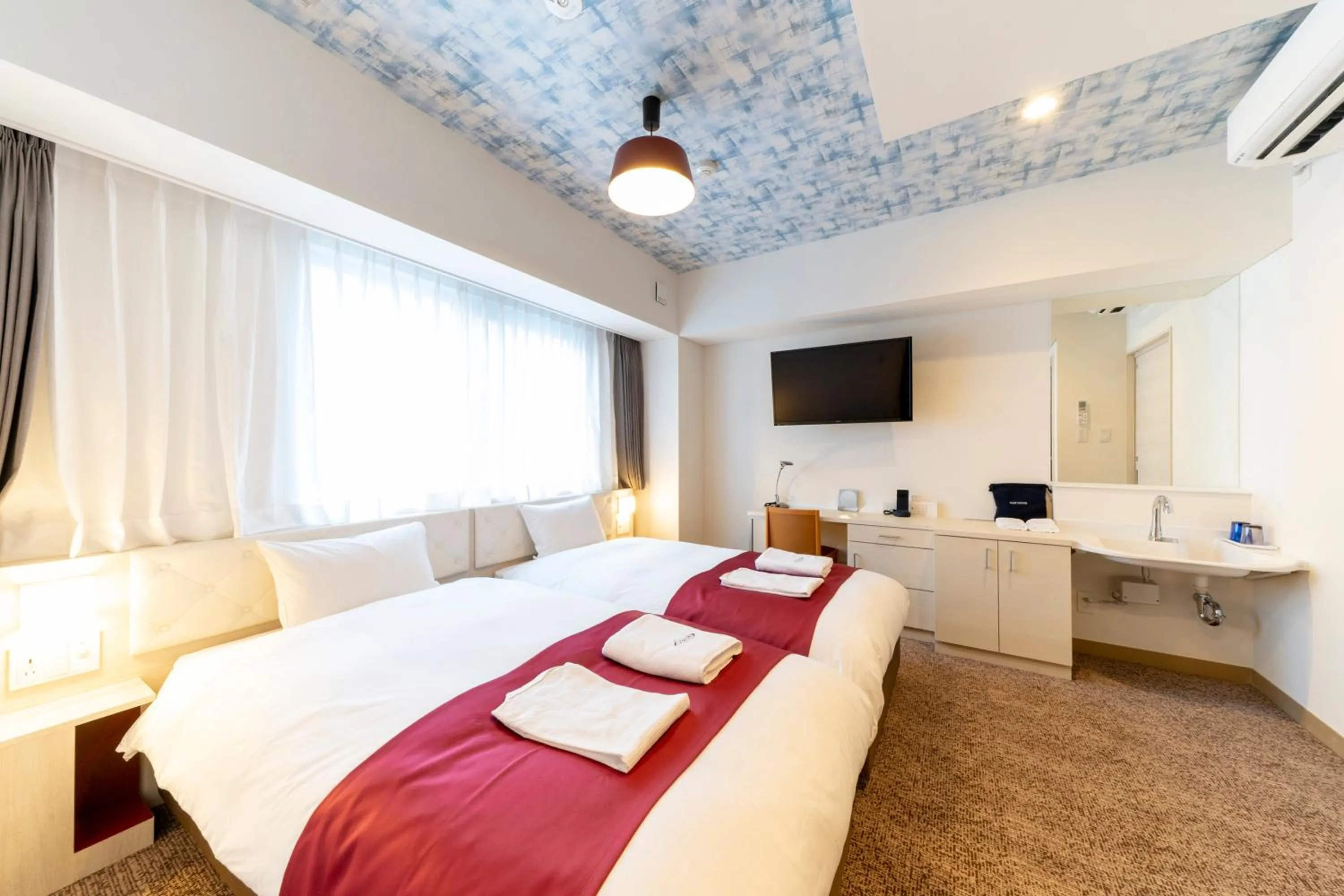 Facility for disabled guests, Bed in Hotel Rosso Karuizawa