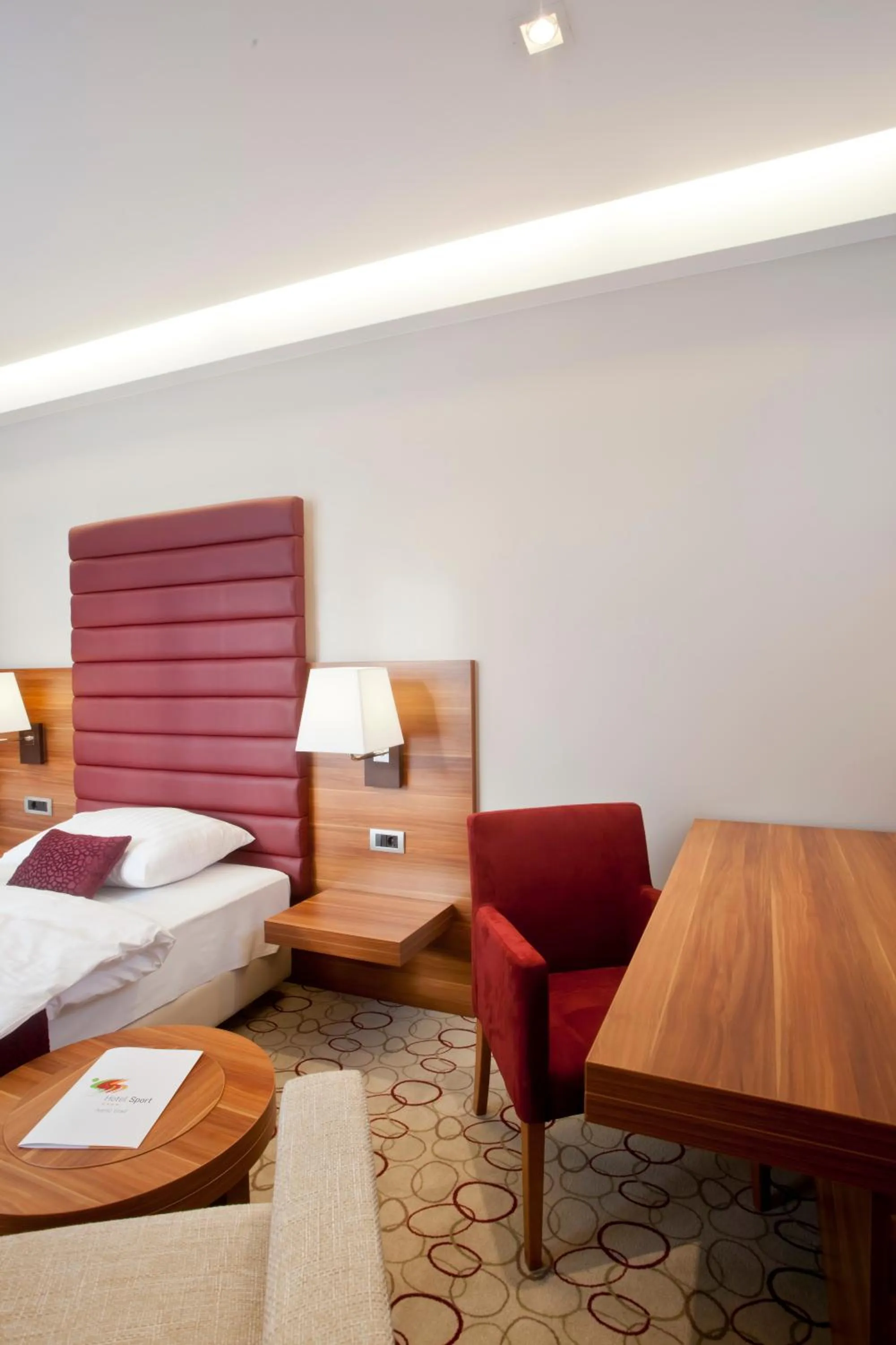 Seating area, Bed in Hotel Sport