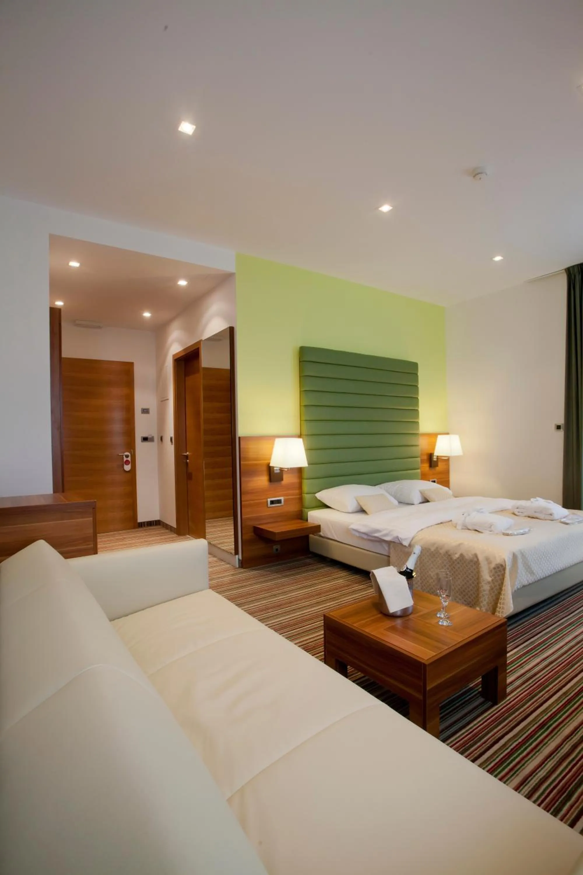 Seating area, Bed in Hotel Sport