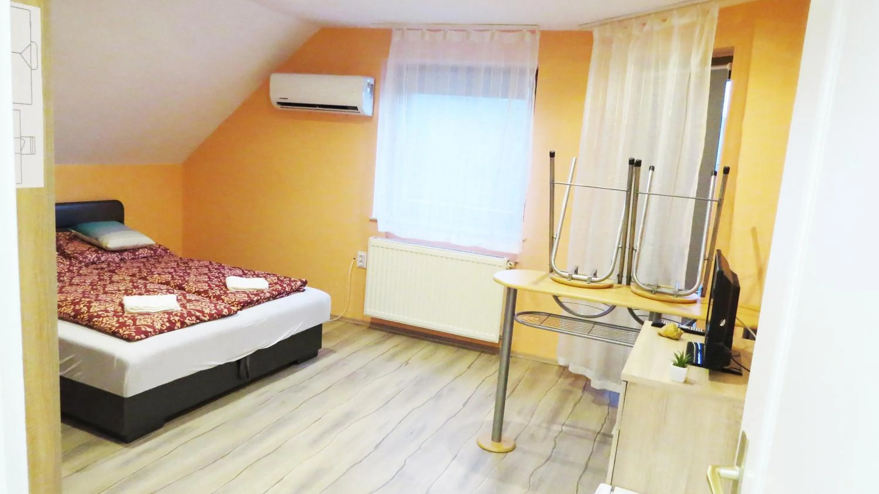 Bed in Hőforrás Wellness Vendégház