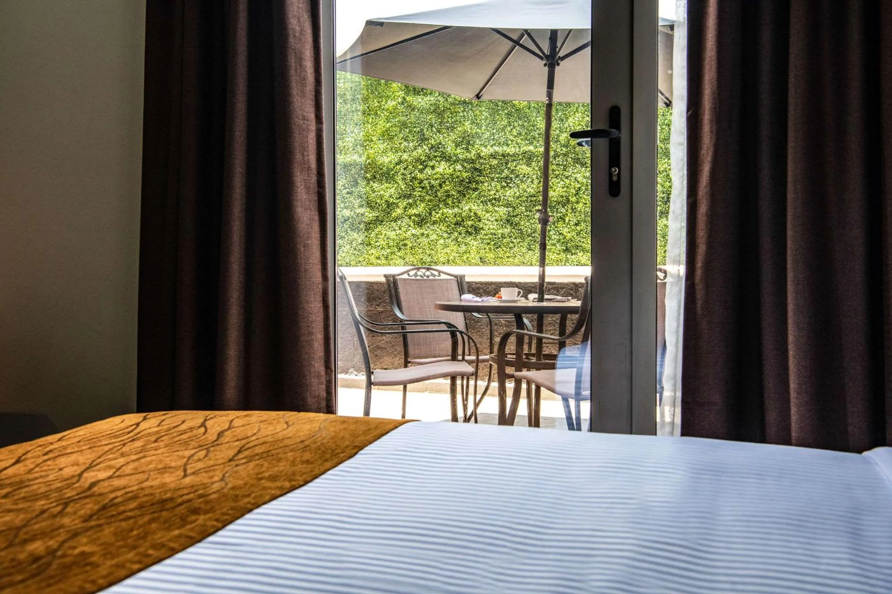 Photo of the whole room, Bed in Comfort Inn Irapuato