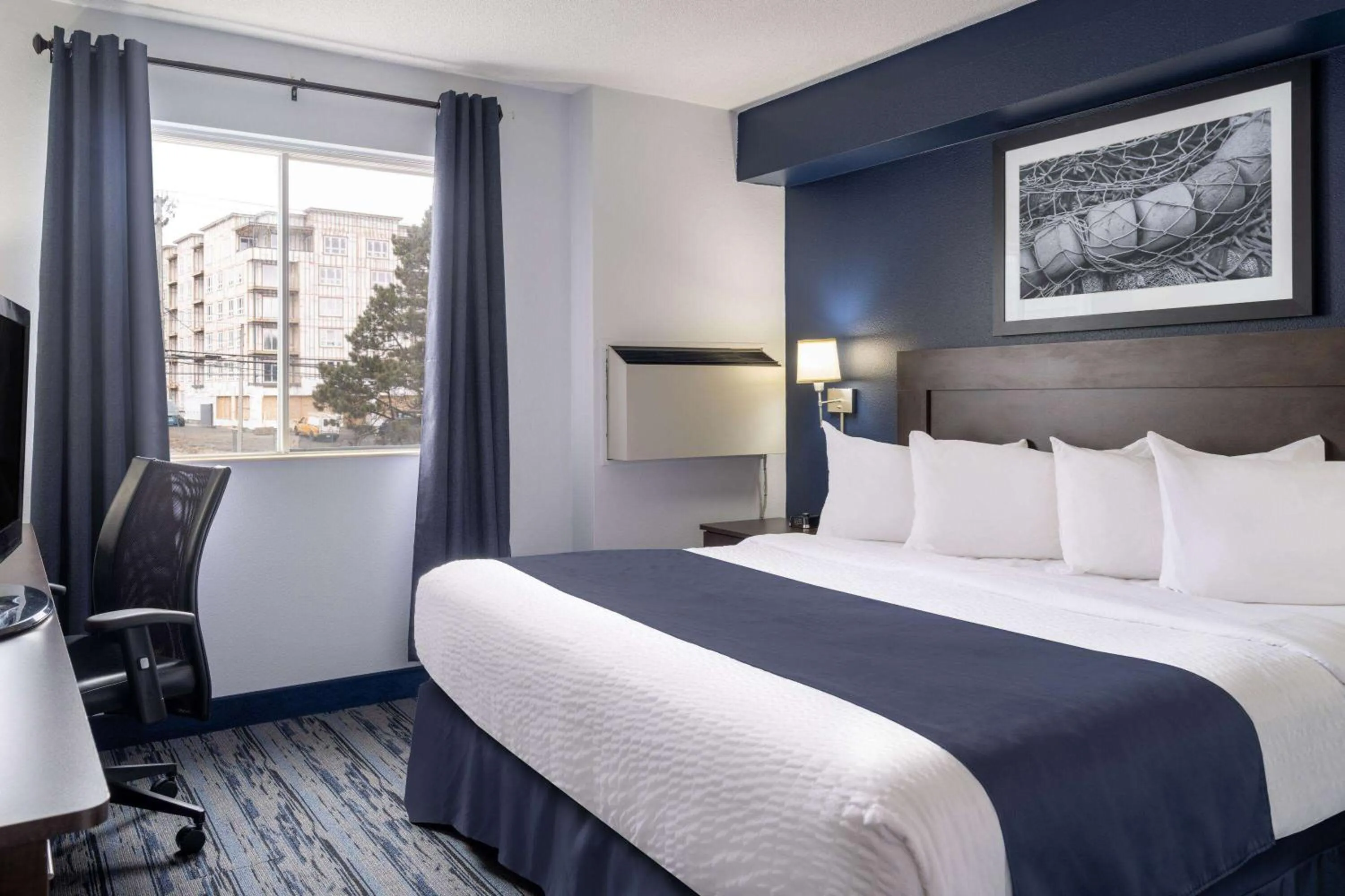 Bed in Travelodge Suites by Wyndham Saint John