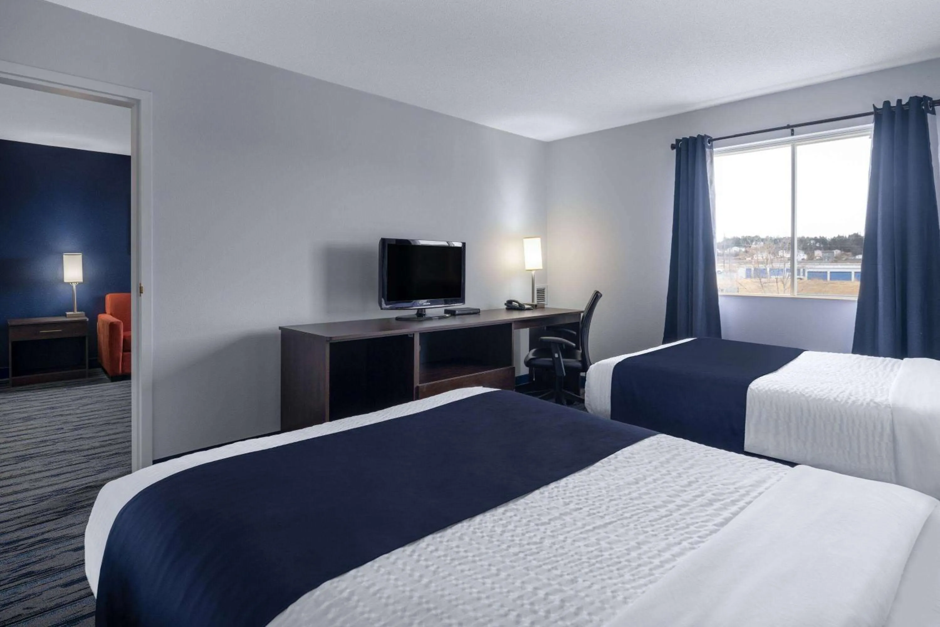 Bed in Travelodge Suites by Wyndham Saint John