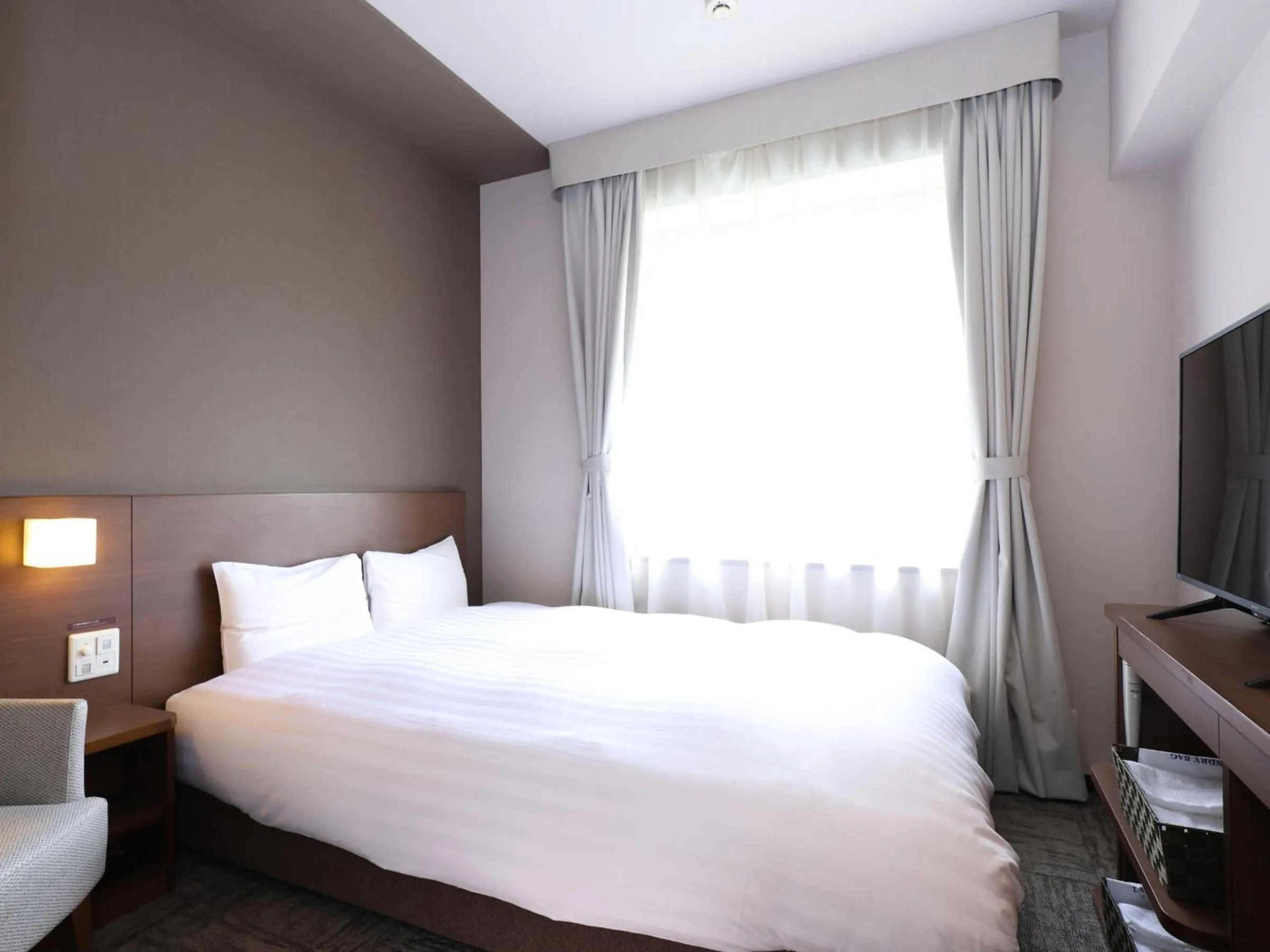 Photo of the whole room, Bed in Dormy Inn Premium Shibuya-jingumae