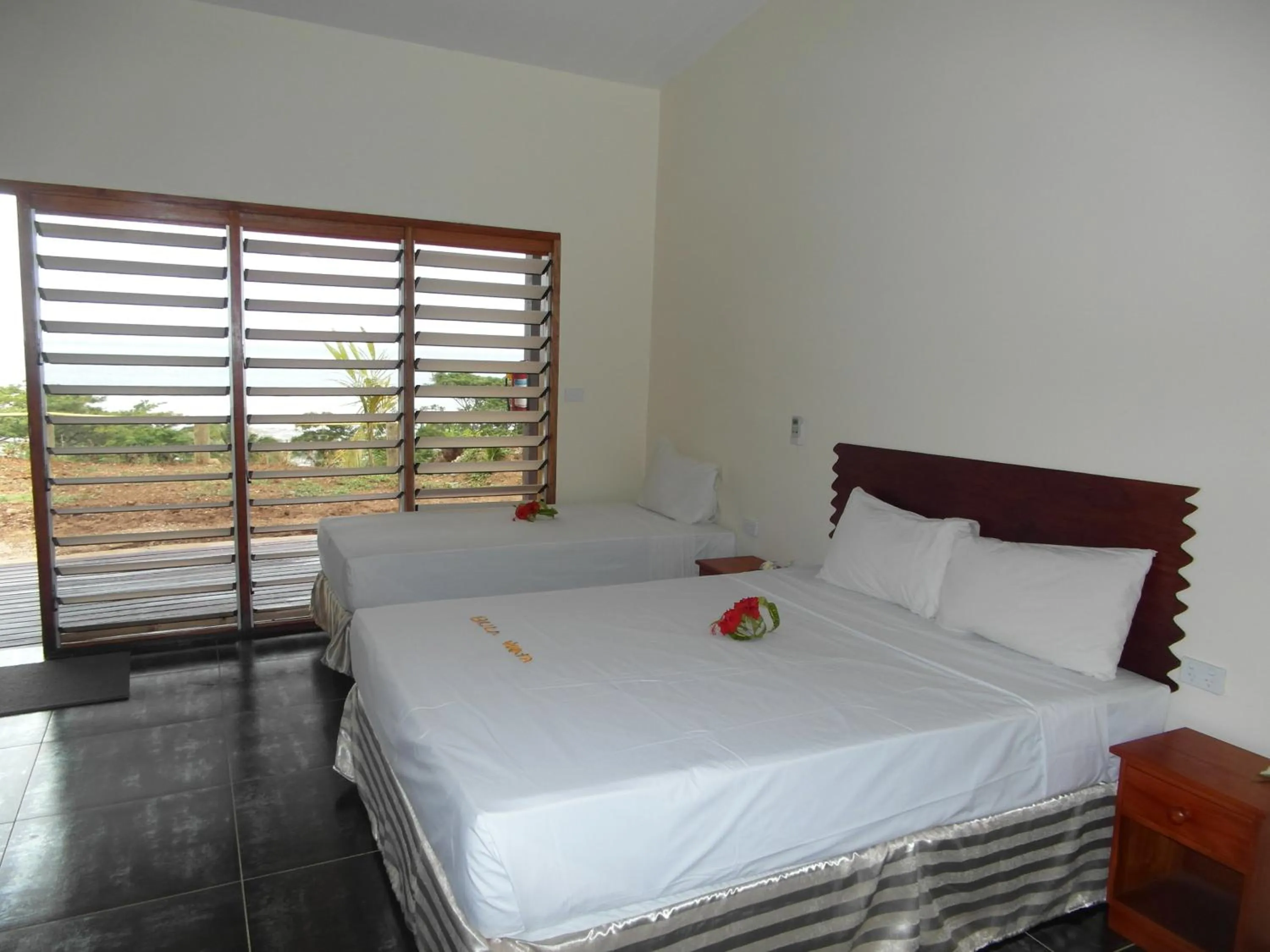 Bed in Funky Fish Beach & Surf Resort