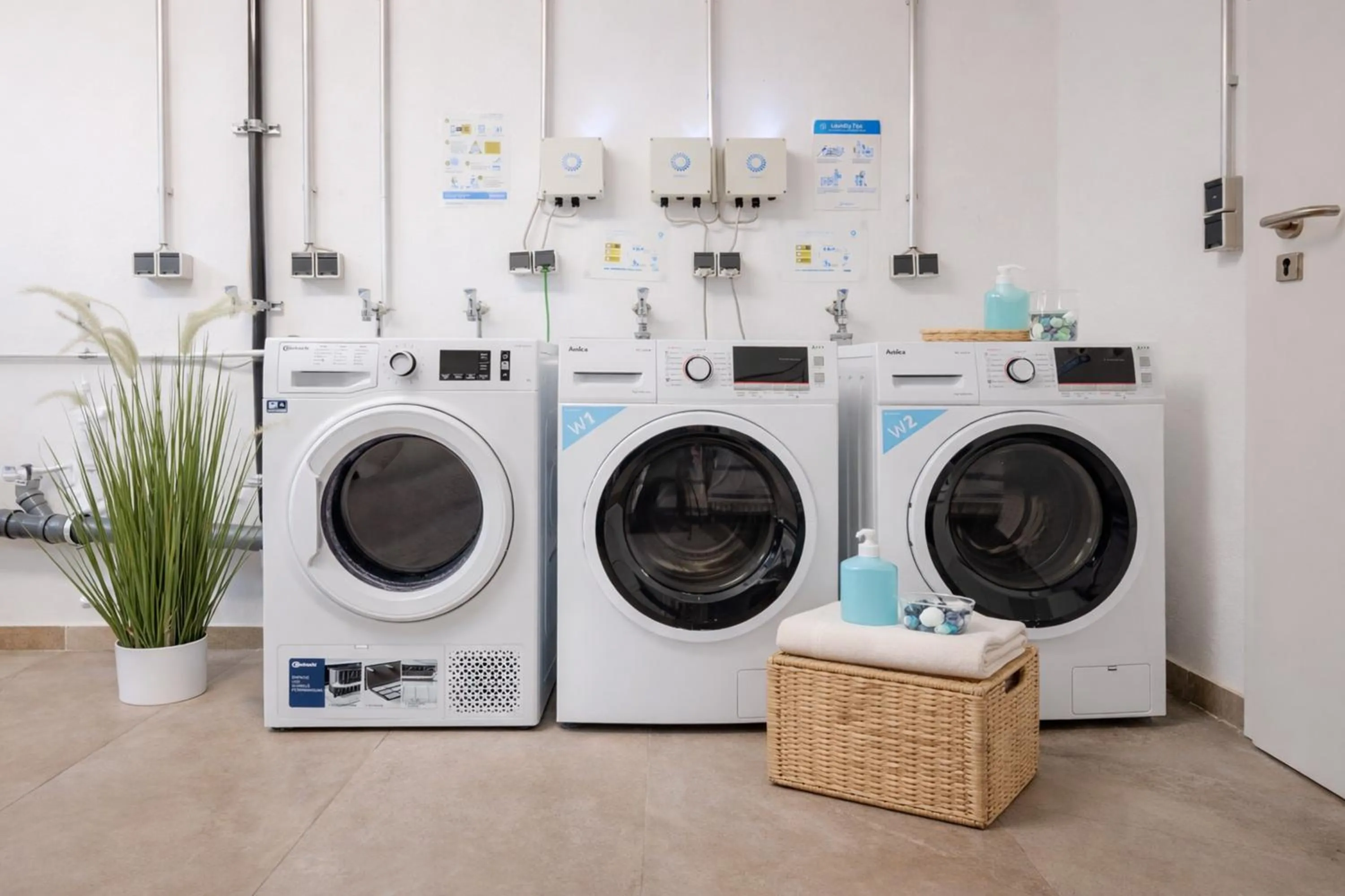 washing machine in Eco Smart Apartments Erlangen