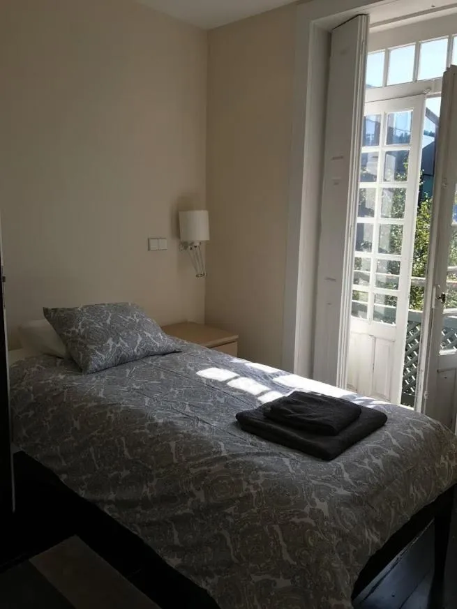 Bedroom, Bed in Camelia Rooms