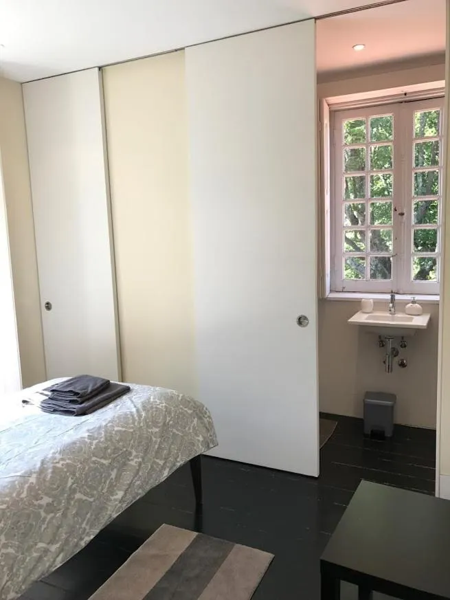 Bedroom, Bed in Camelia Rooms