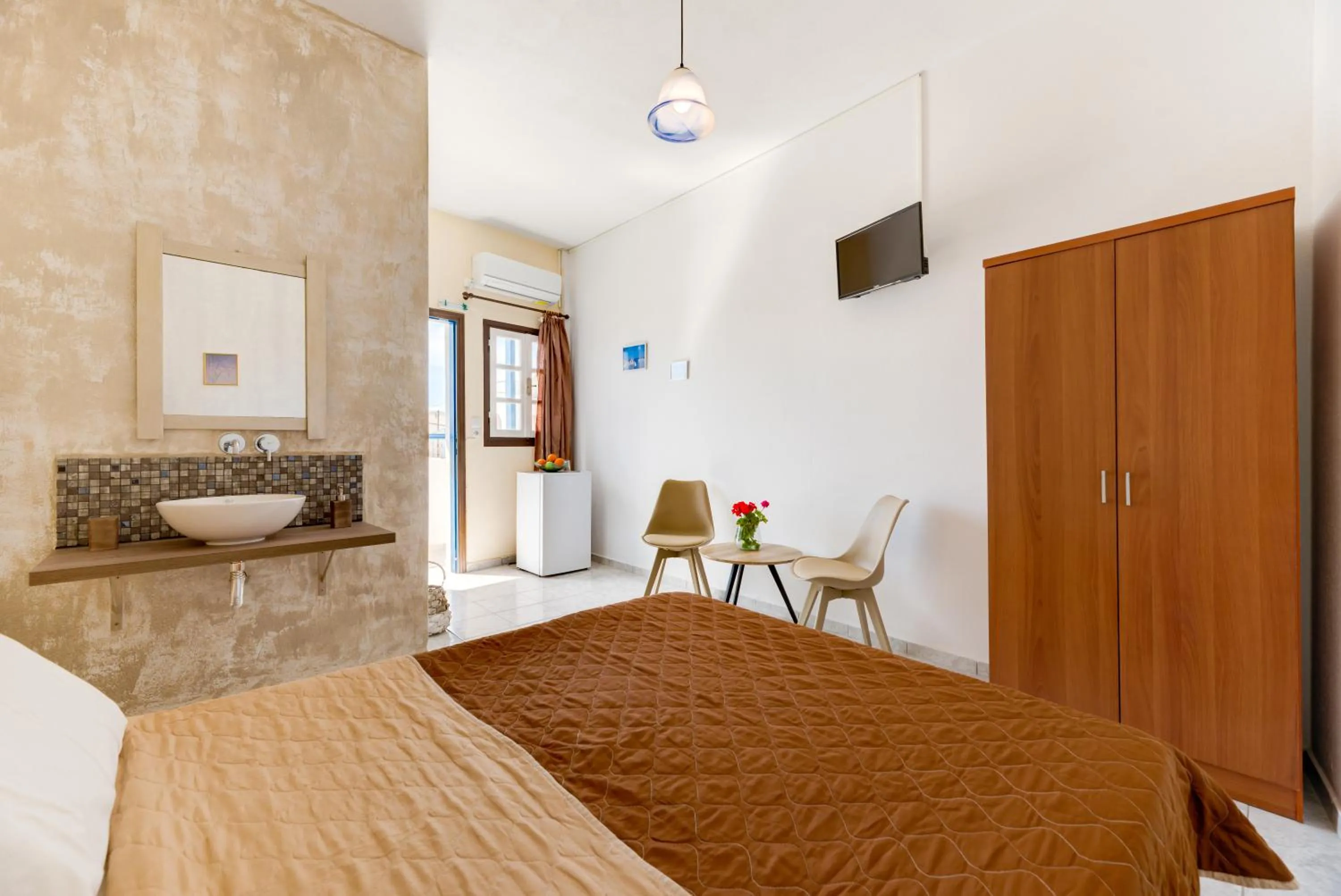 Bed in Onar Rooms & Studios