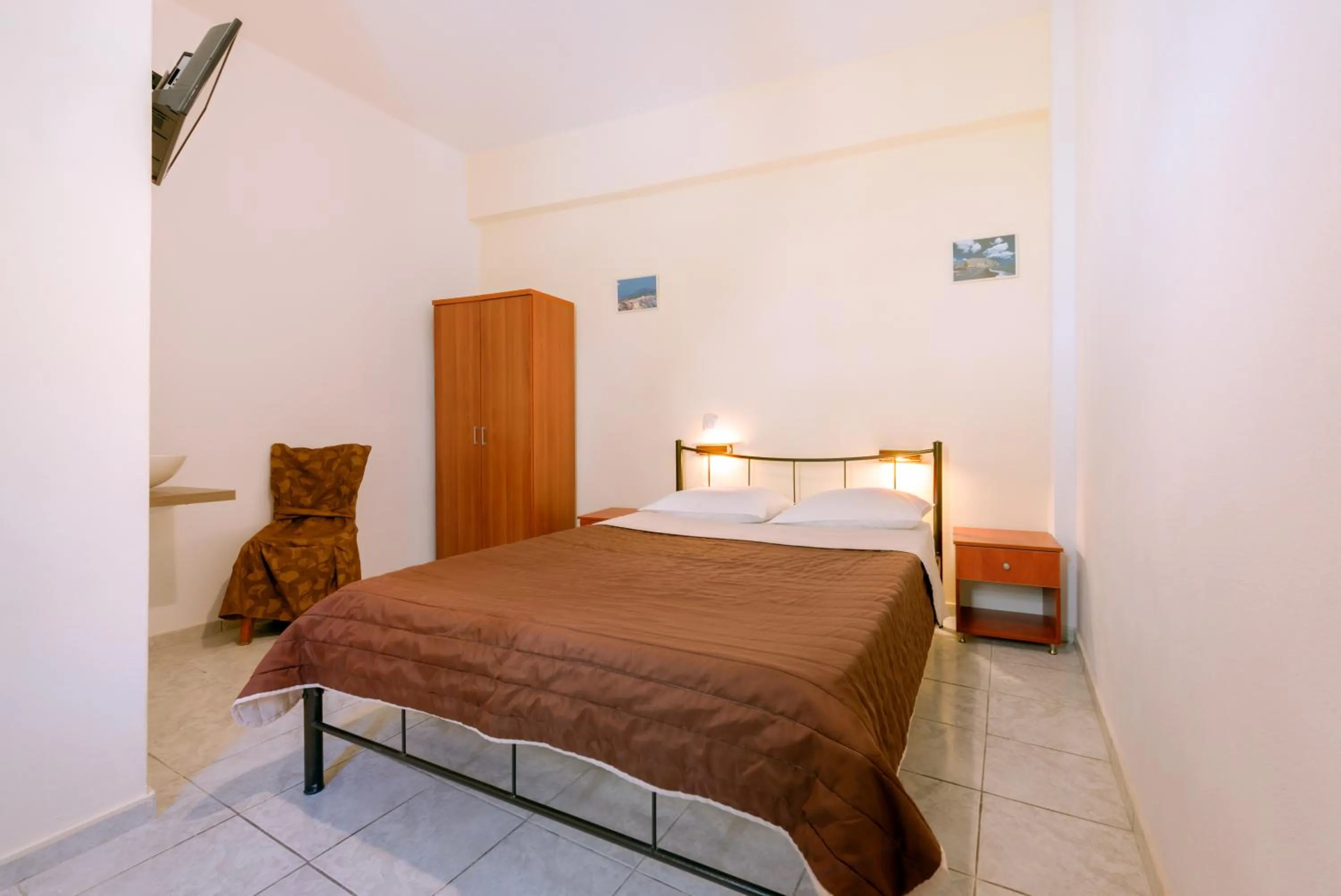 Bed in Onar Rooms & Studios