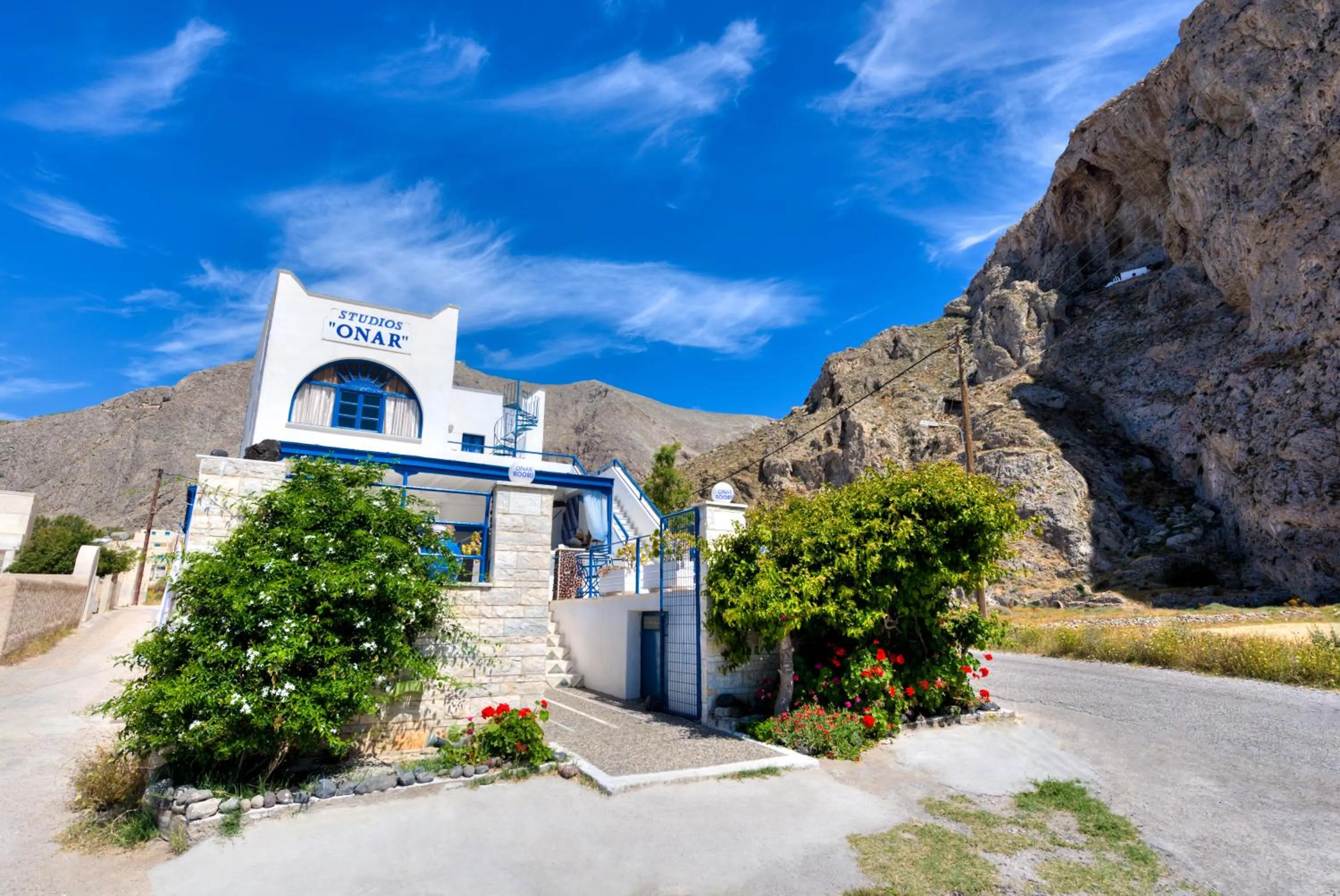 Property building in Onar Rooms & Studios