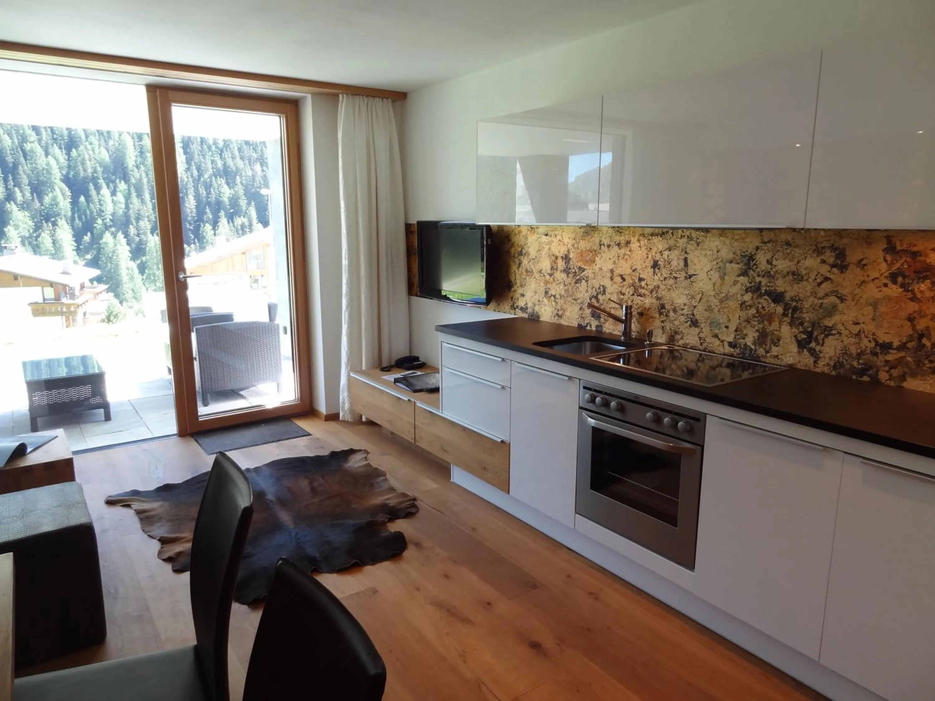 Kitchen or kitchenette in Alpinlodge & Spa
